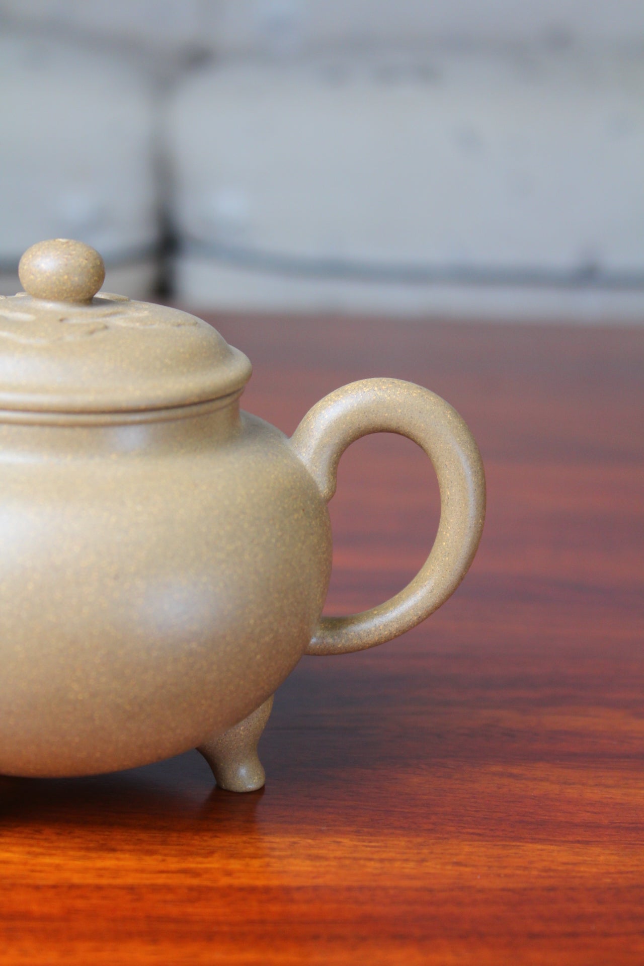 Purple clay teapot handle