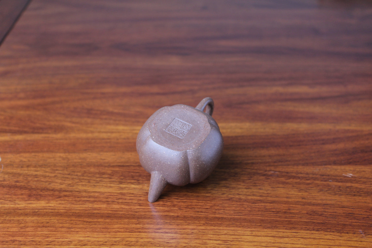 Bottom of the Artistic teapot on the table