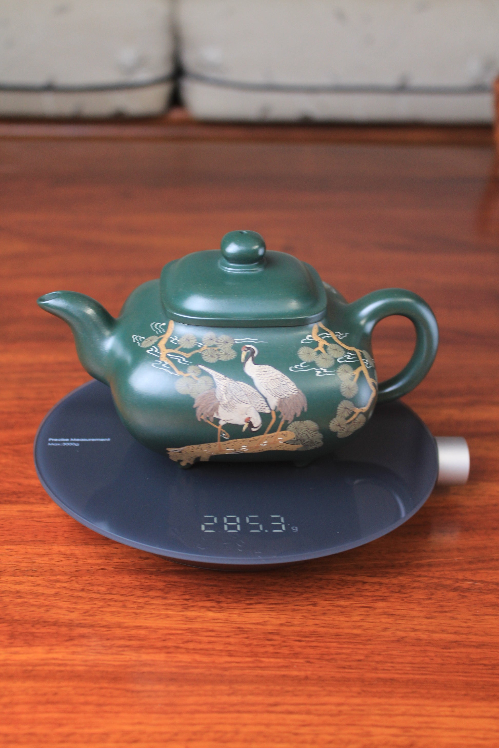 The weight of the Artistic teapot from teapot artist on the table