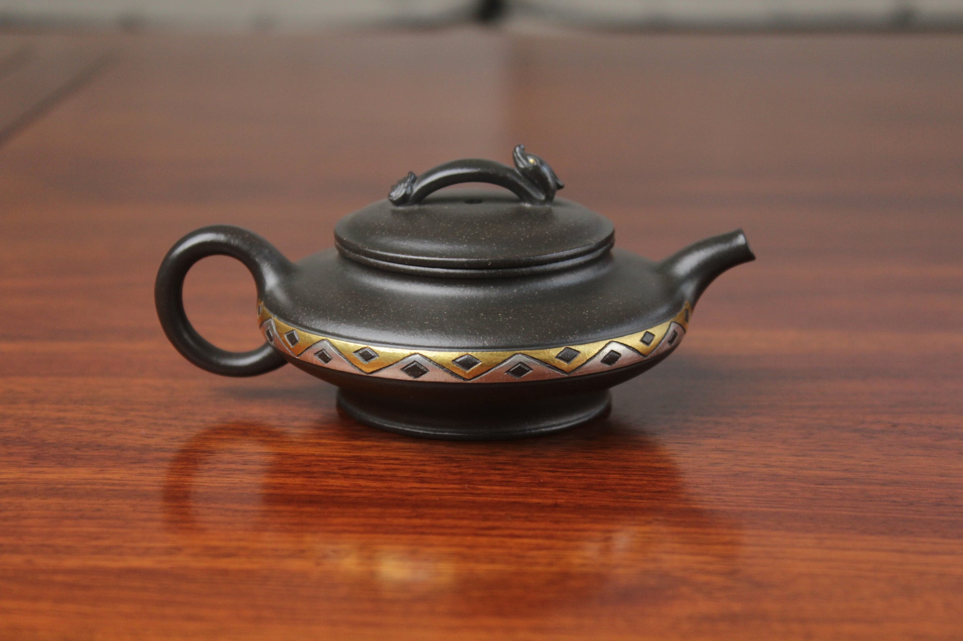 back detail of chinese pot made with purple clay from yixing zisha art gallery