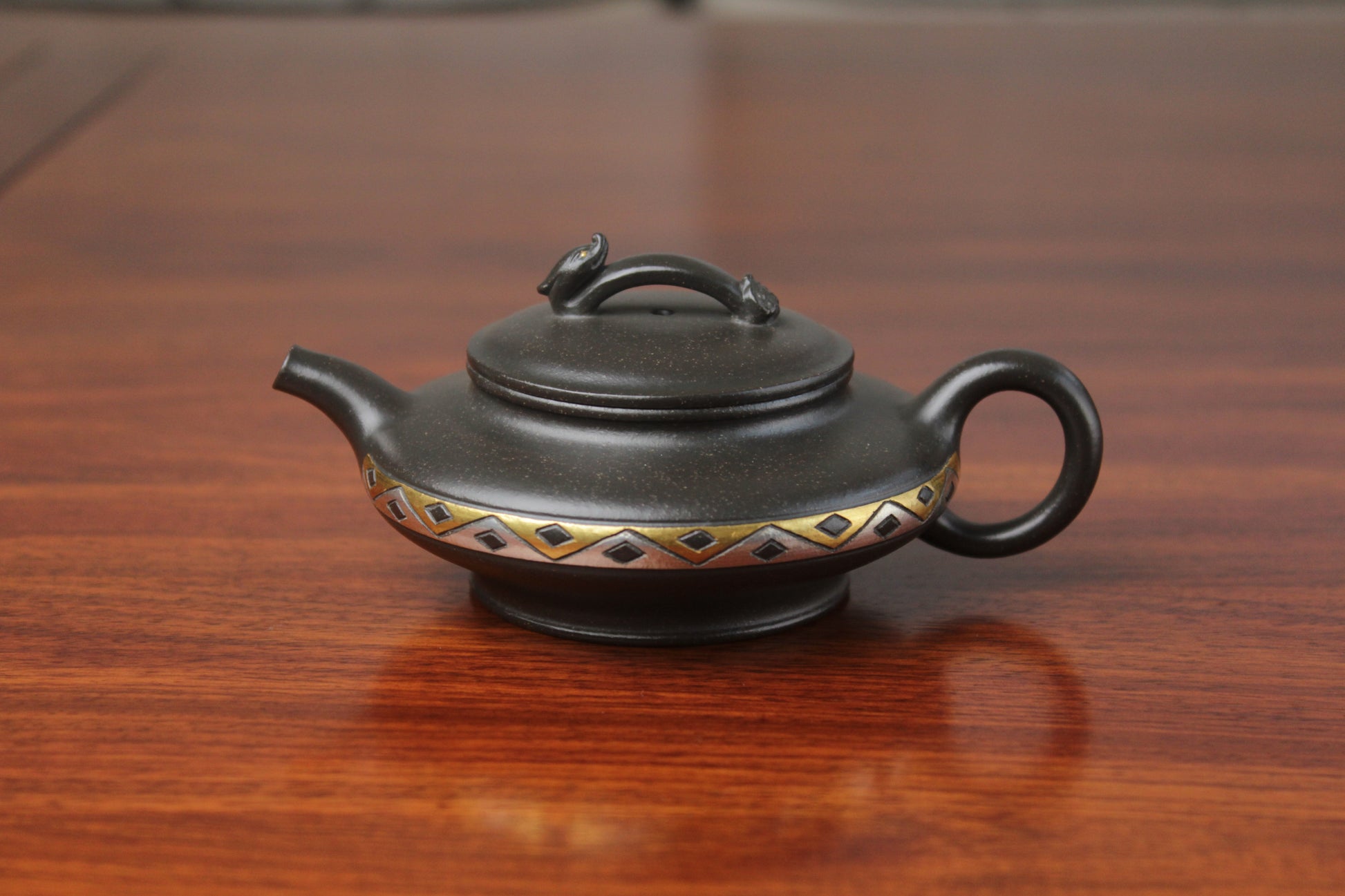 front detail of chinese pot made with purple clay from yixing zisha art gallery