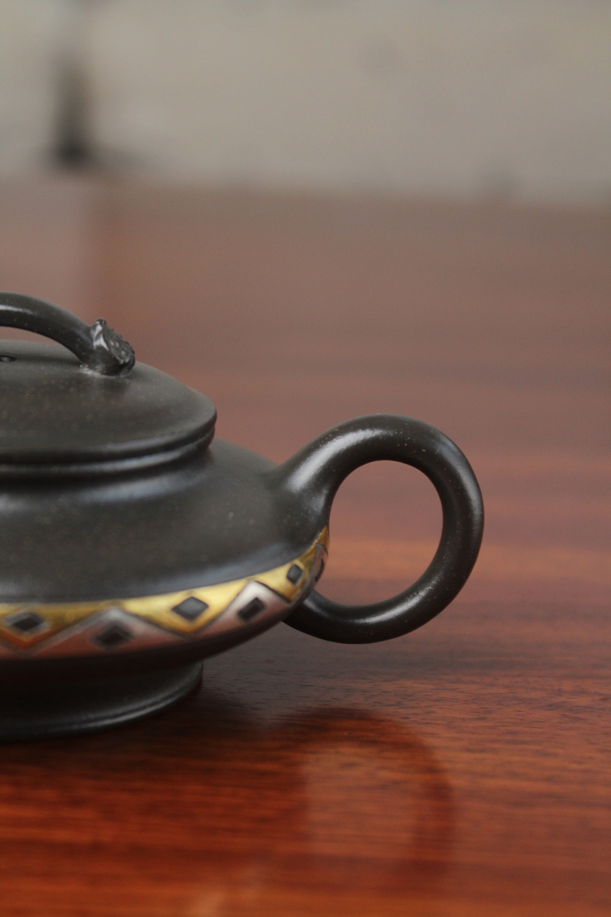 handle of chinese pot made with purple clay from yixing zisha art gallery