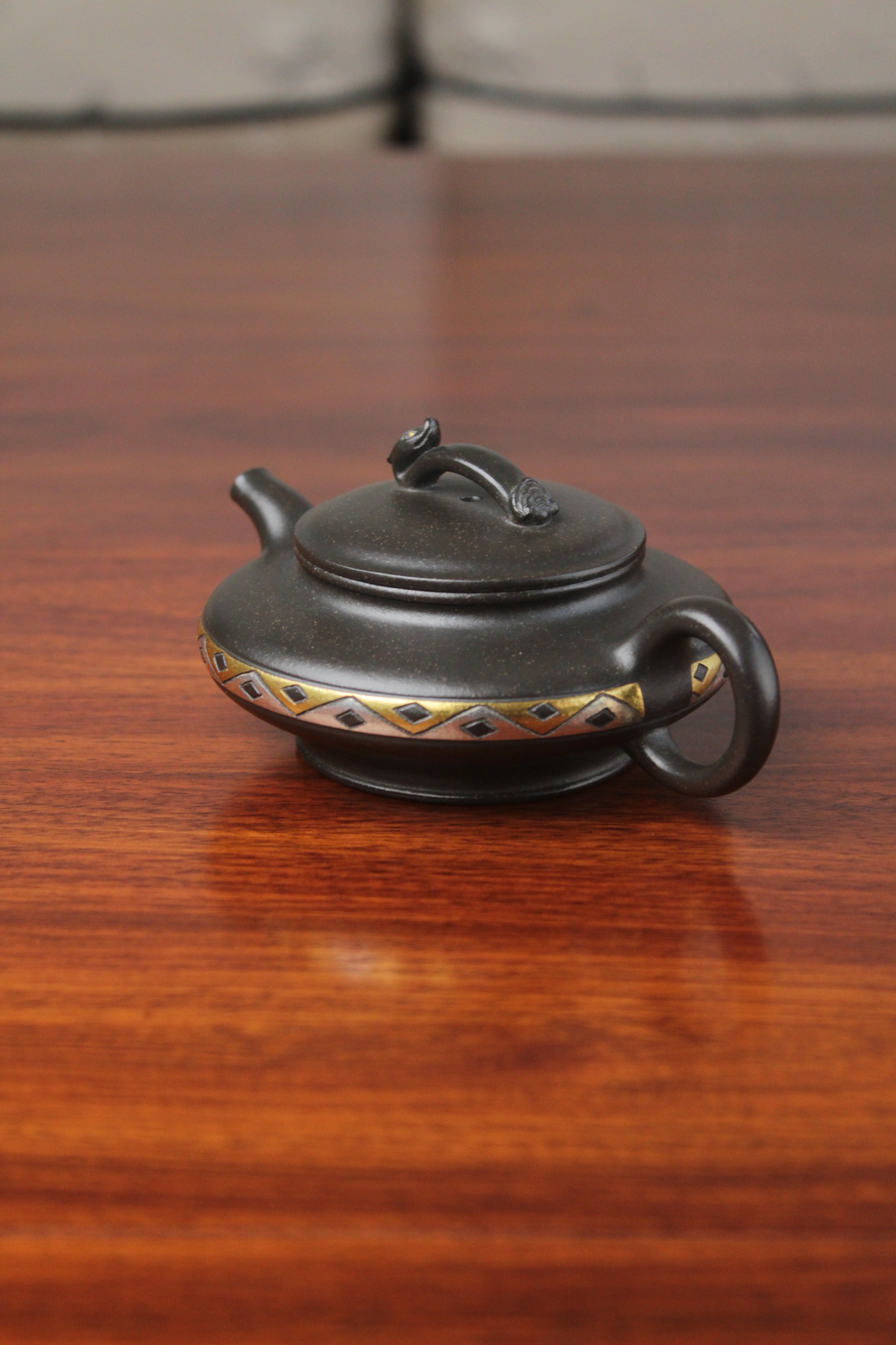 Right of chinese pot made with purple clay from yixing zisha art gallery