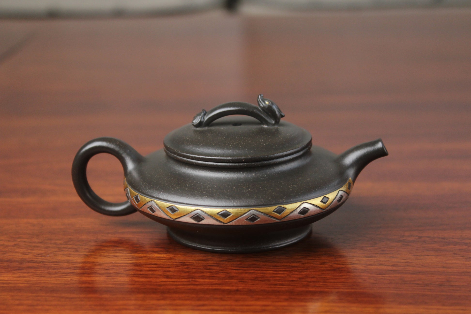 back detail of chinese pot made with purple clay from yixing zisha art gallery