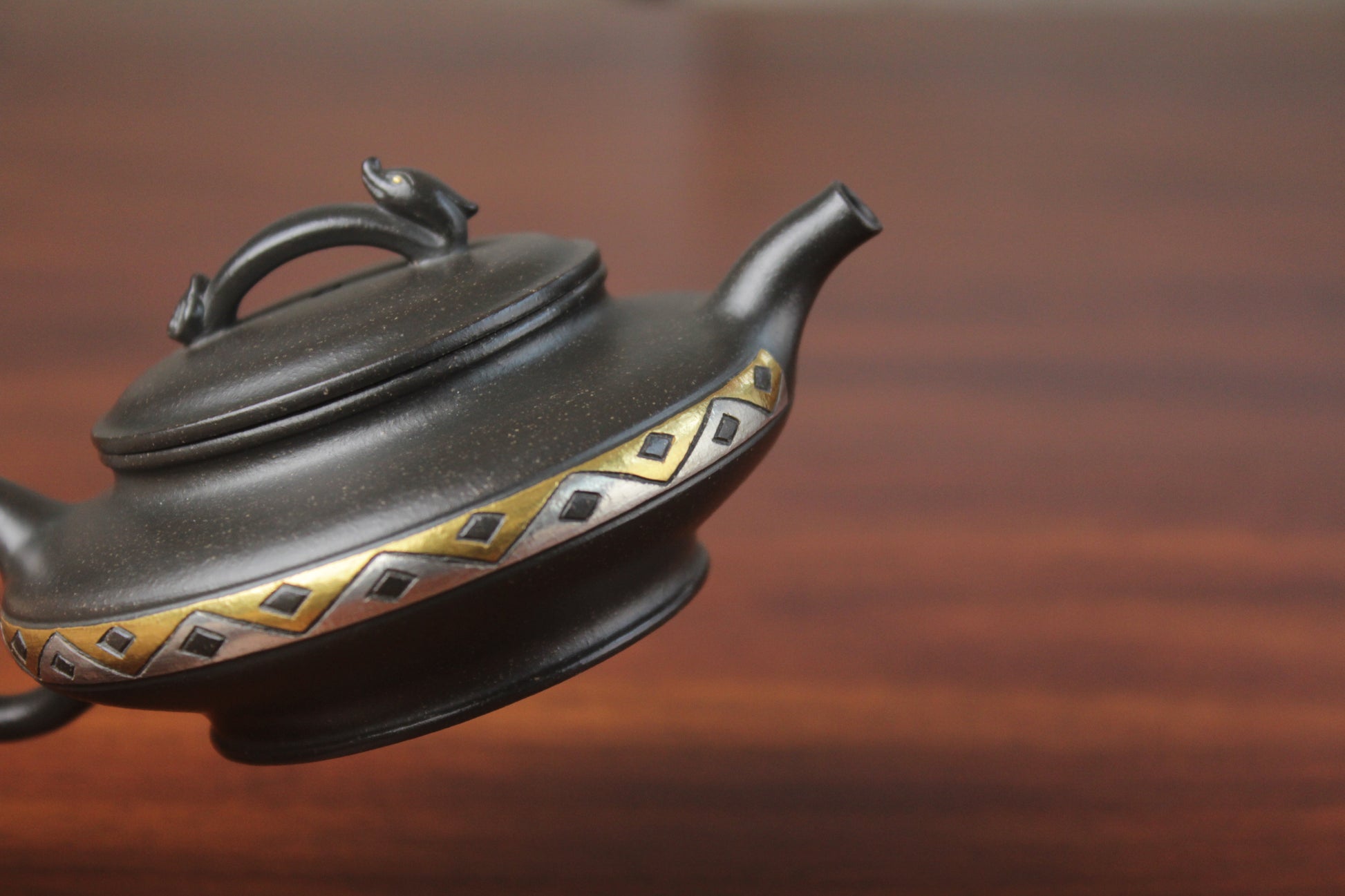 Spout detail of chinese pot made with purple clay from yixing zisha art gallery