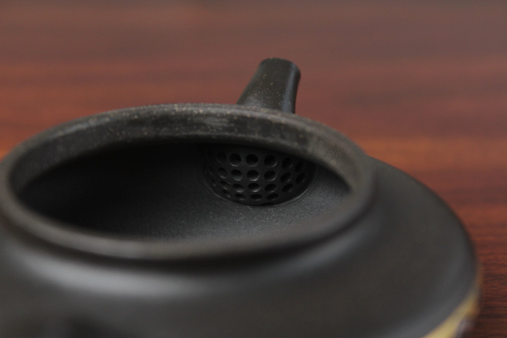 filter of chinese pot made with purple clay from yixing zisha art gallery