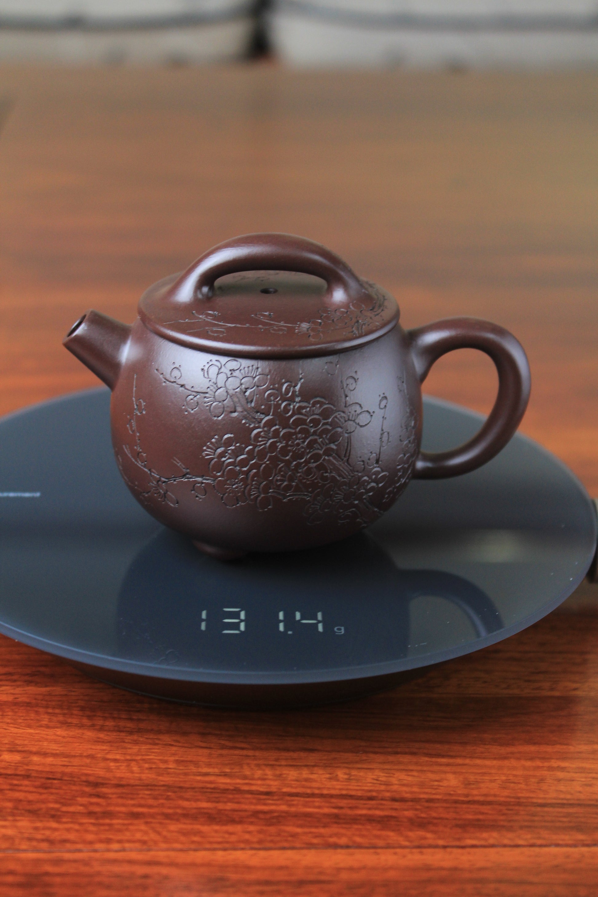 weight of the Cute chinese teapot handmade with purple clay