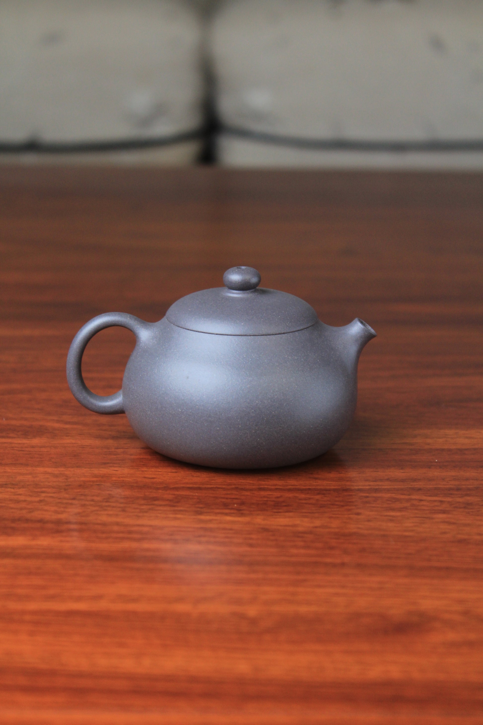Back of chinese teapot xishi on the table