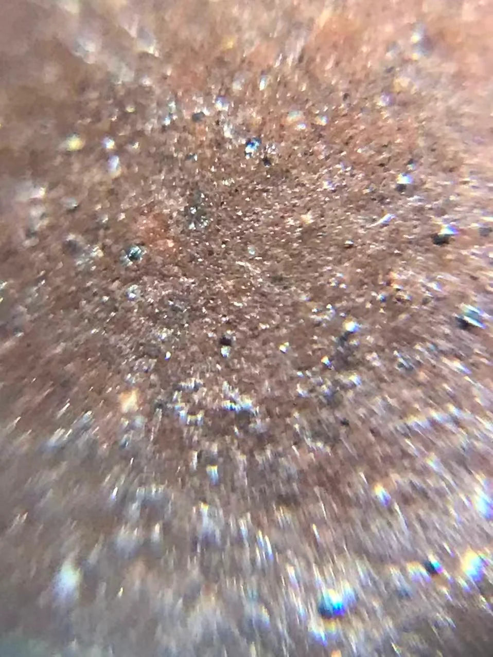 A macro photo of the teapot's aged lao zini clay