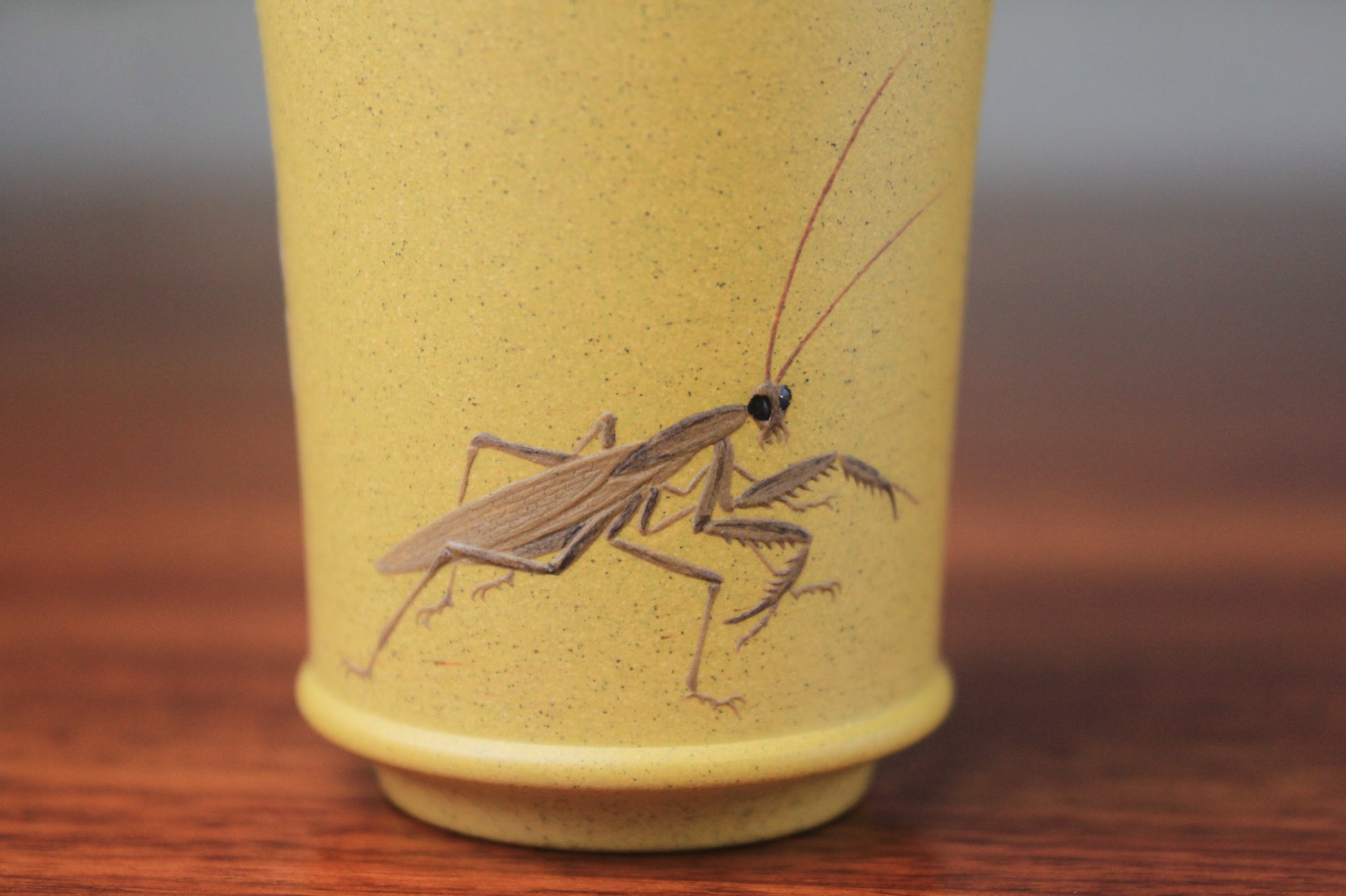 Detail of Clay teacup on the table