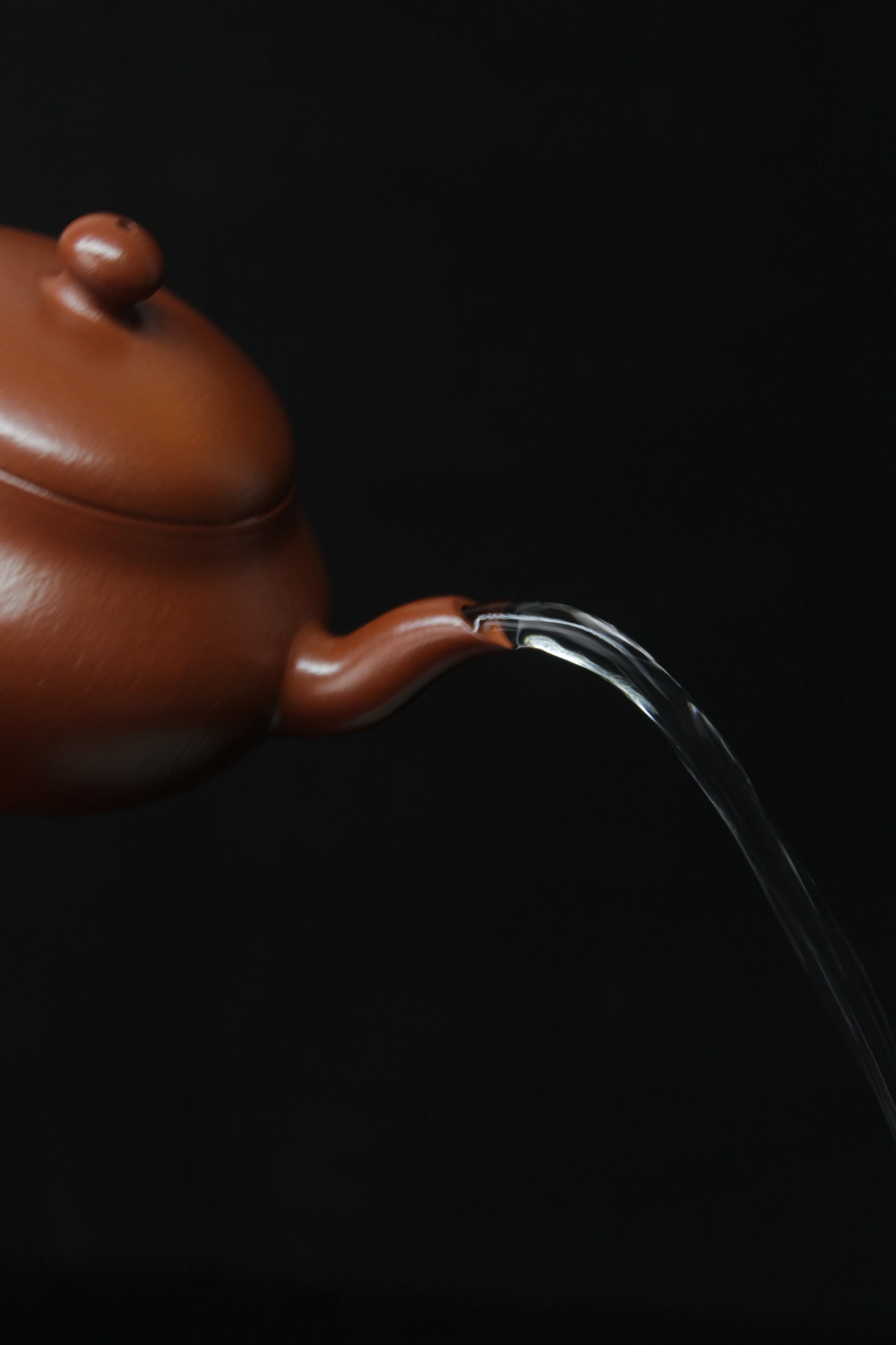Pour of Clay teapot handmade with purple clay from zisha art galley