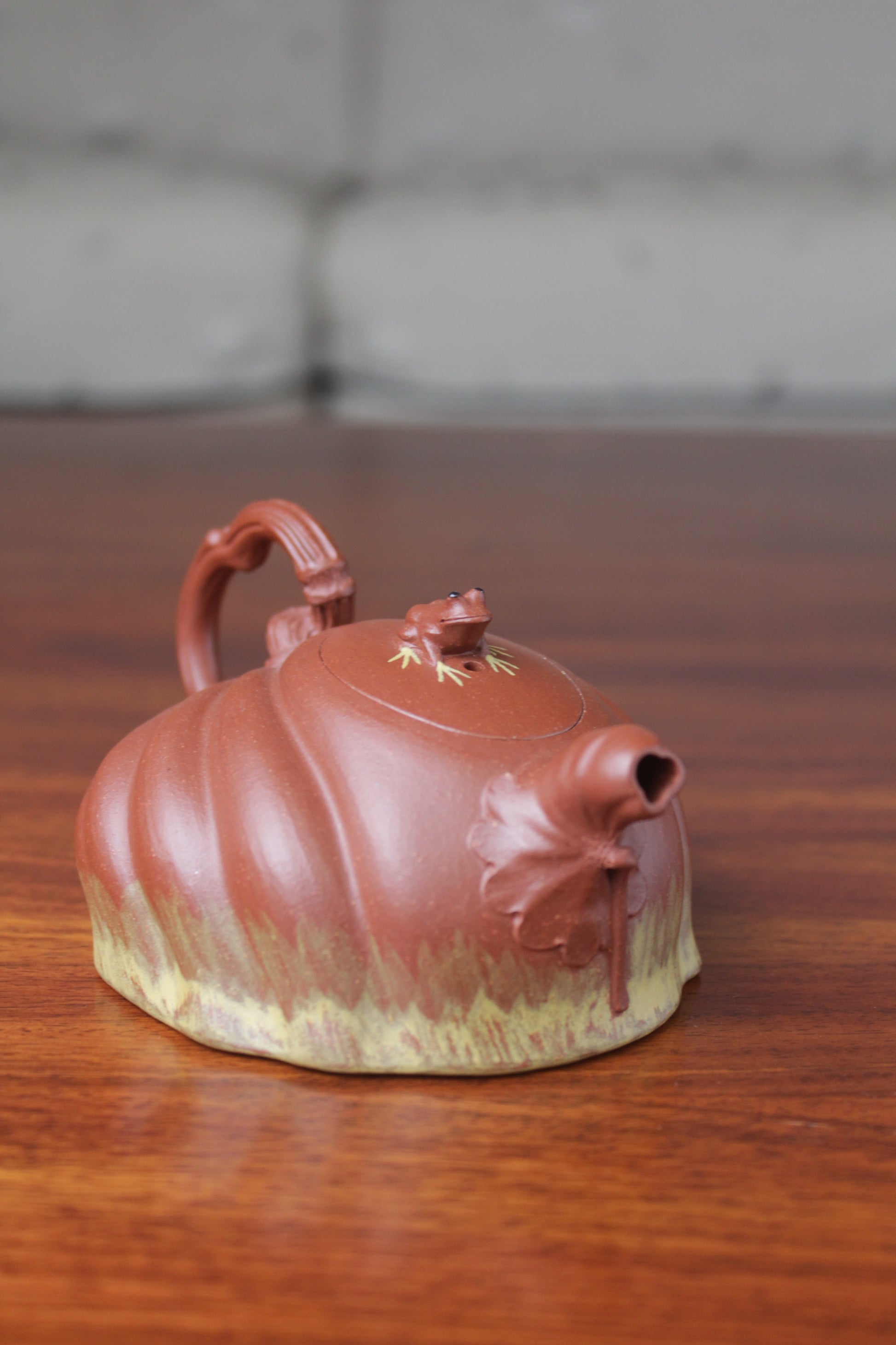 Left view of the Collectible teapot handmade by teapot artist