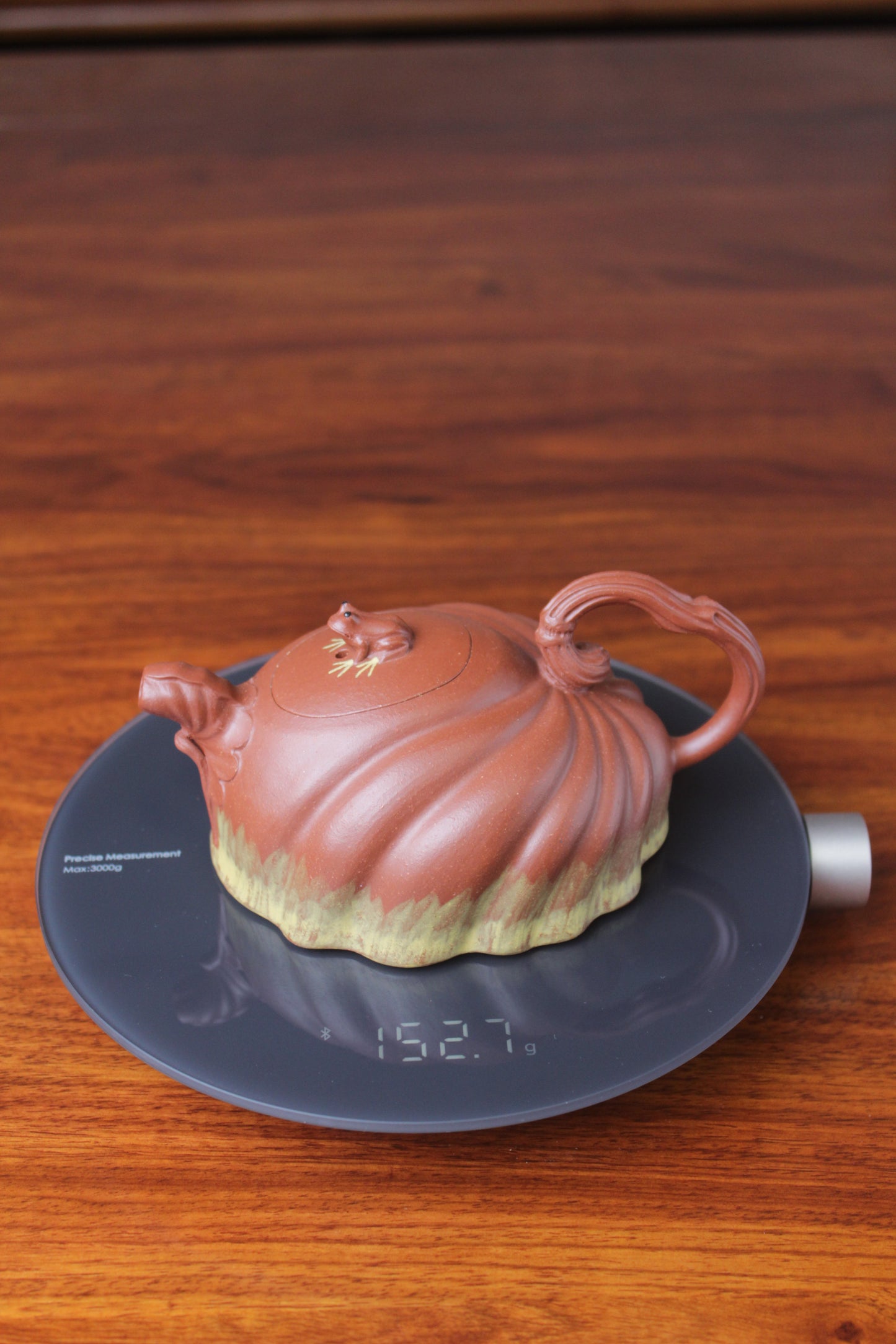 The weight of the Collectible teapot handmade by teapot artist
