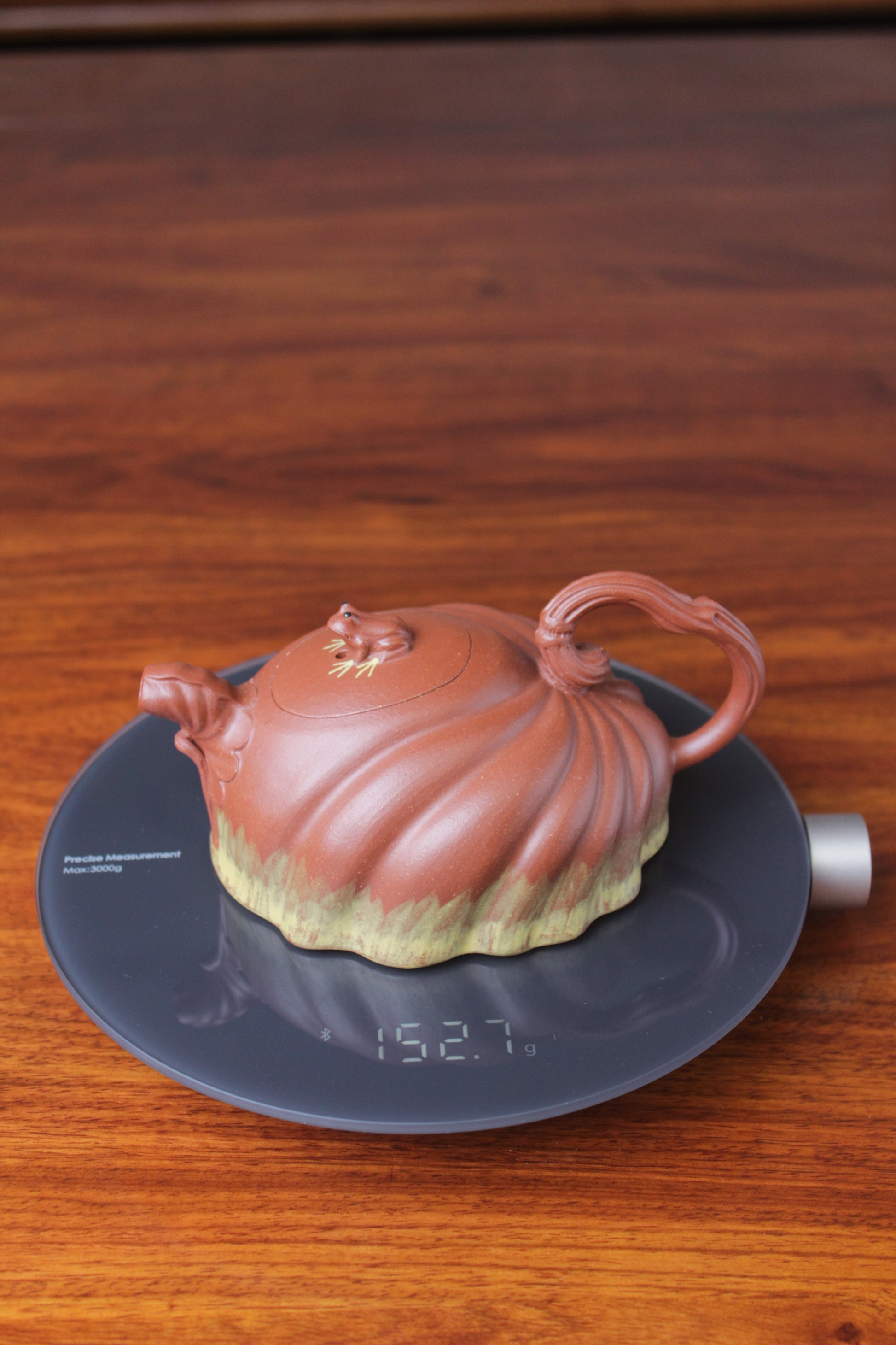 The weight of the Collectible teapot handmade by teapot artist