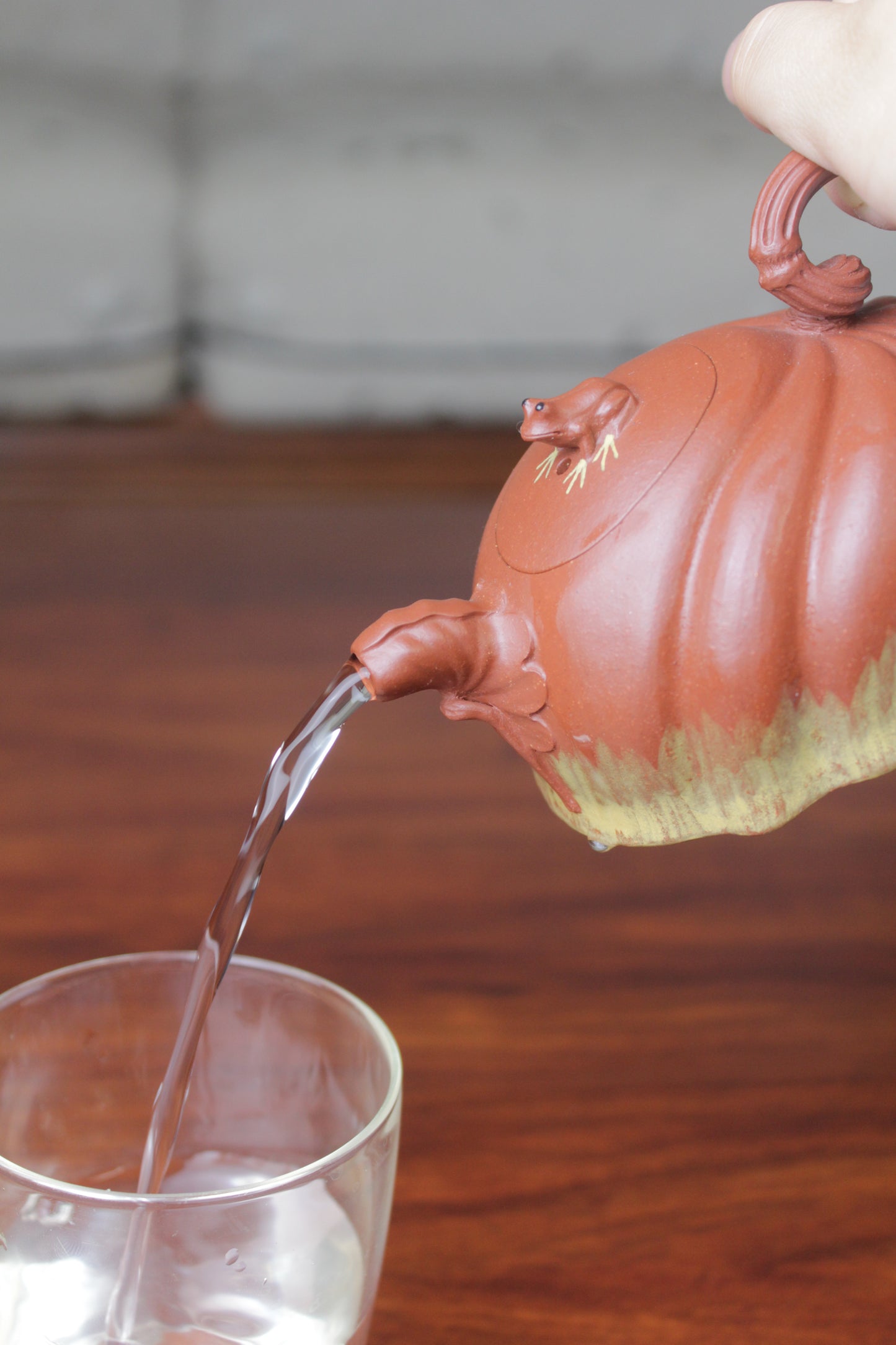 Pour of the Collectible teapot handmade by teapot artist