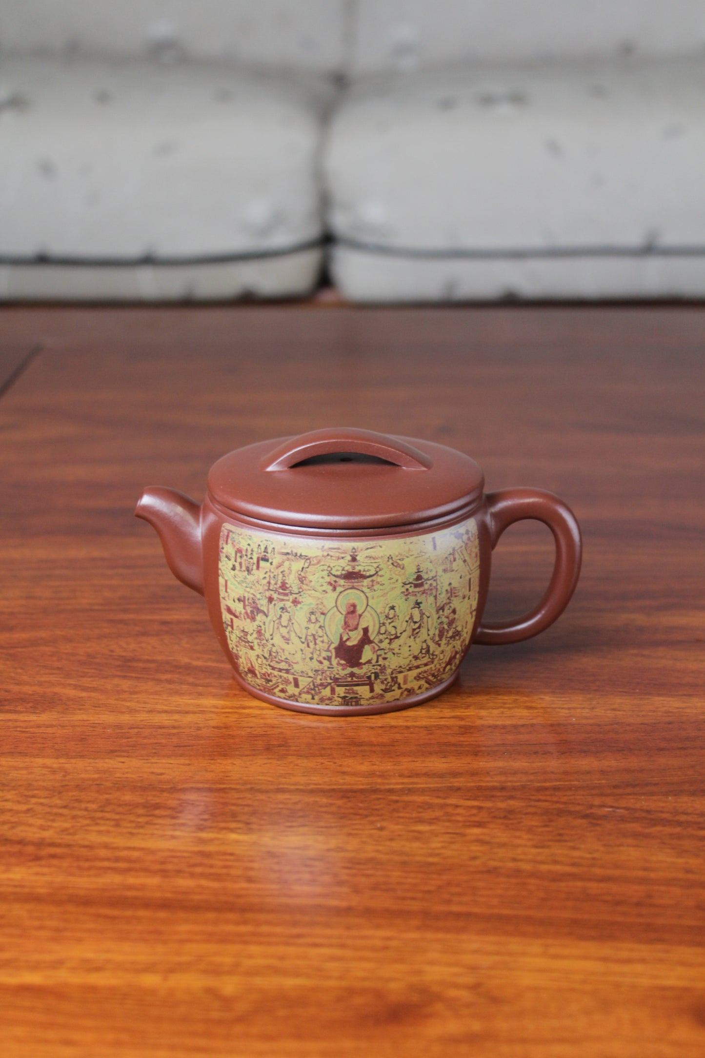 Collectible teapot named han wa on the table