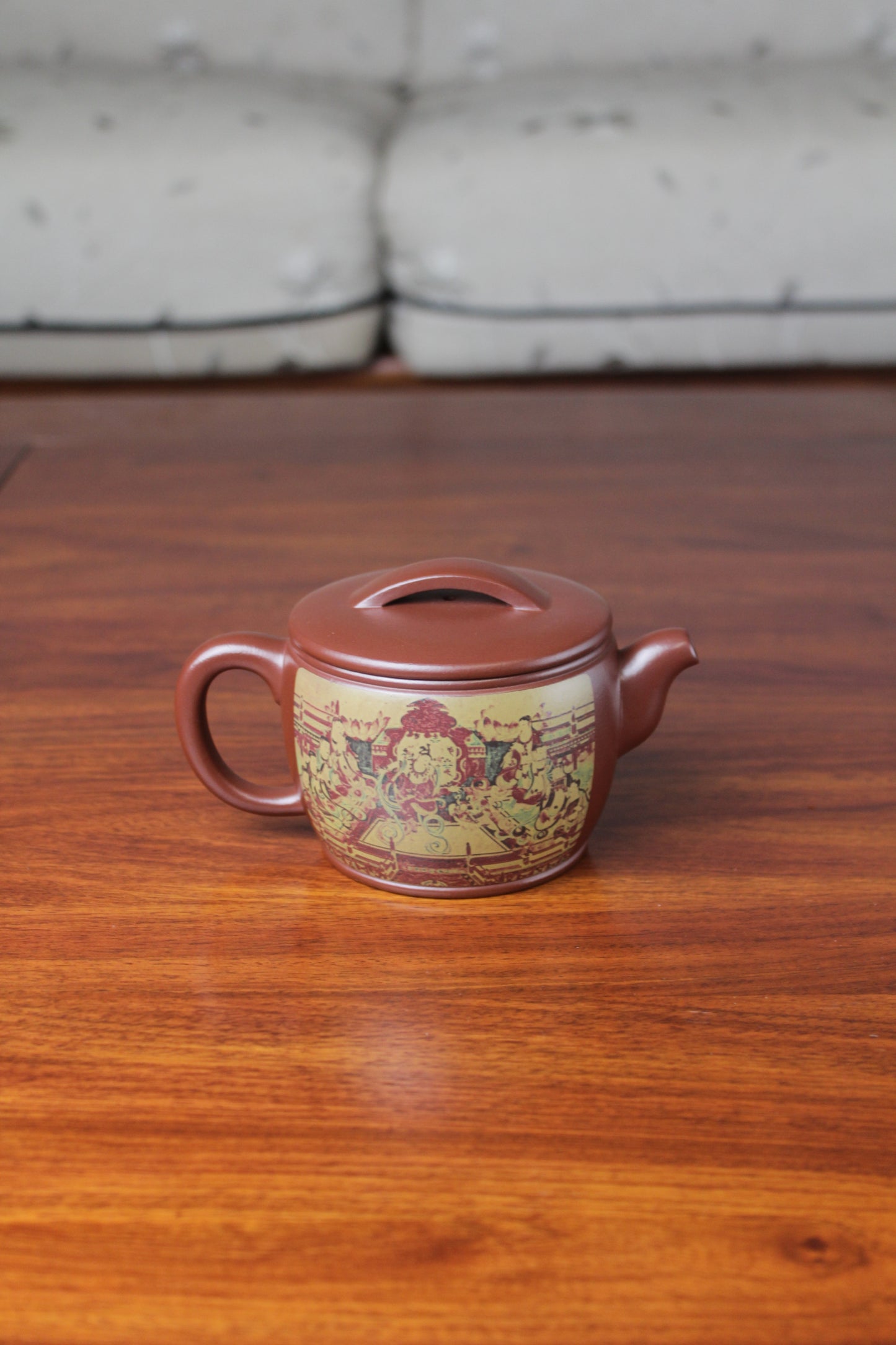 Back view of the Collectible teapot named han wa on the table