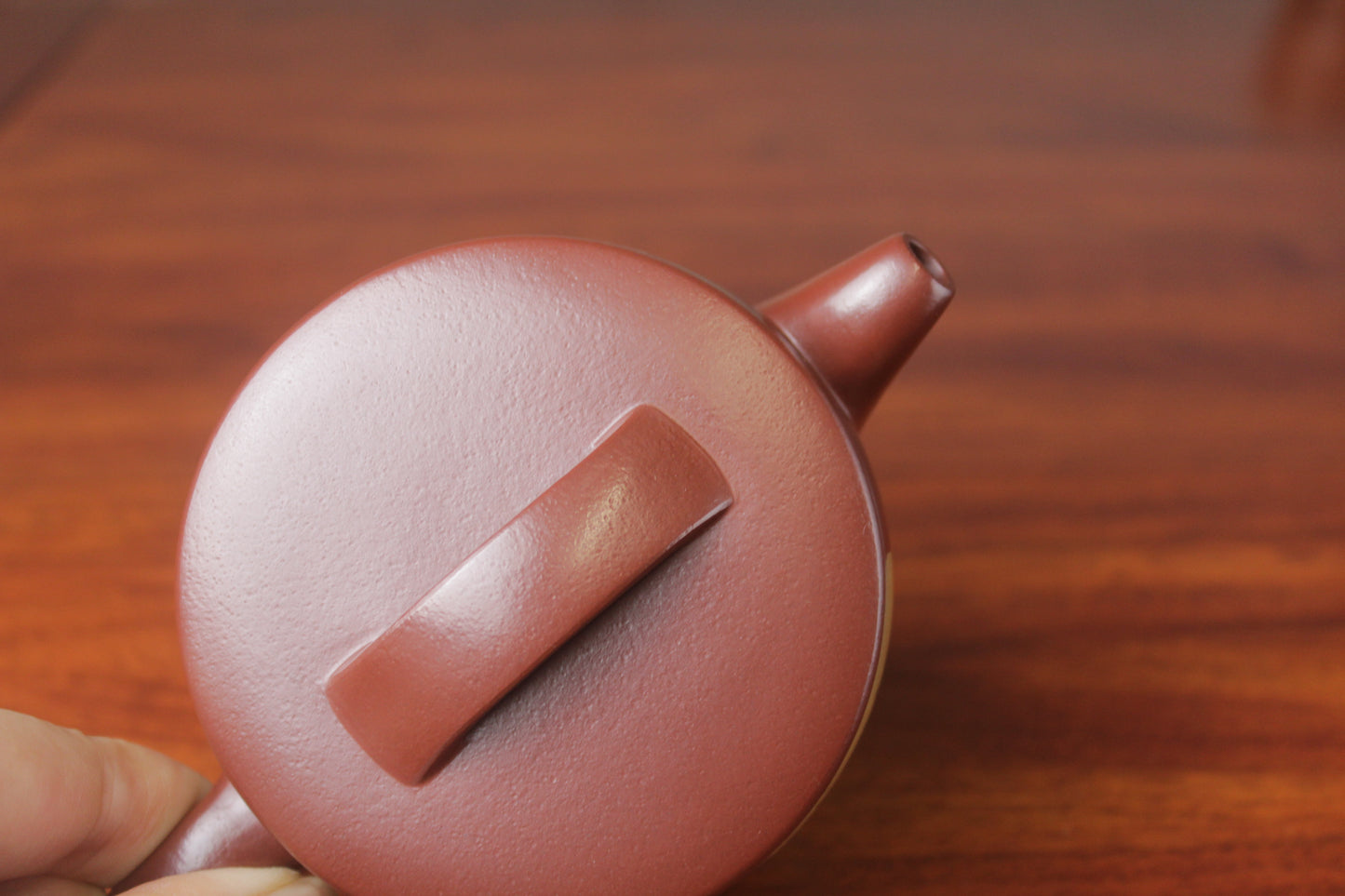 lid of the Collectible teapot named han wa on the table