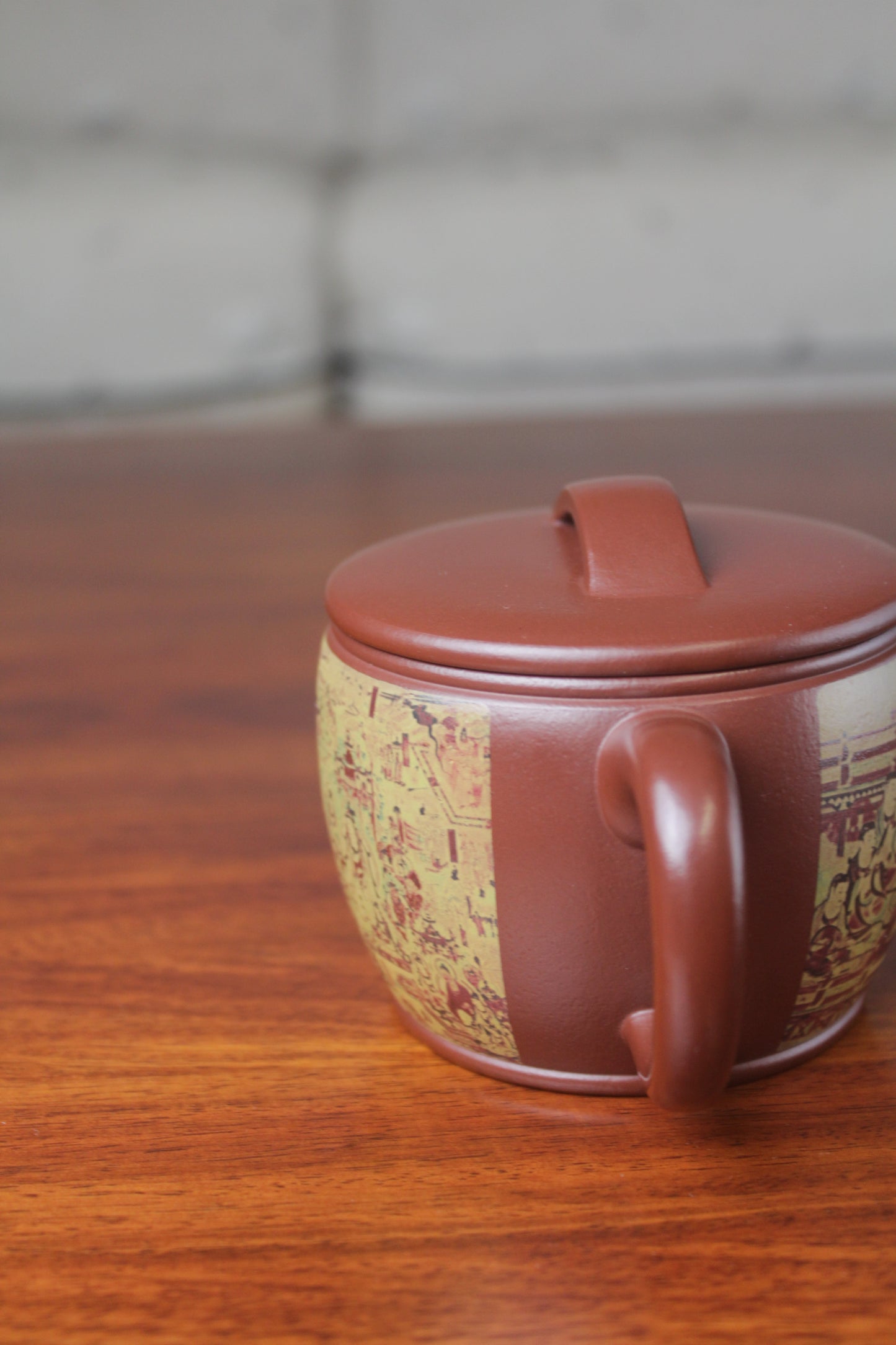 Left view of the Collectible teapot named han wa on the table