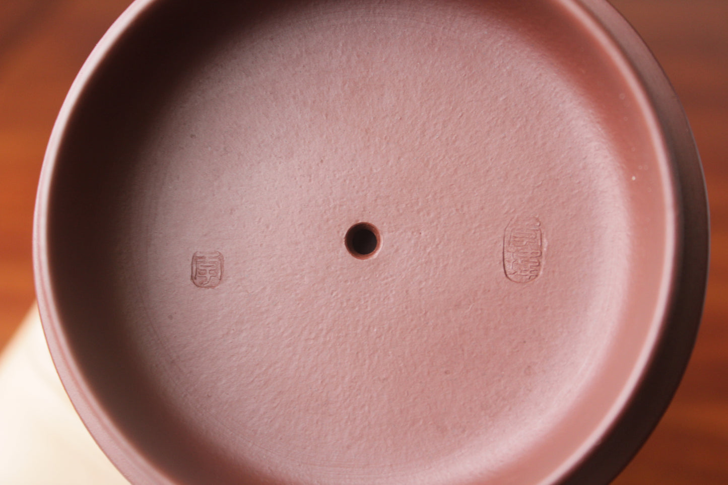 Mark 2 of the Collectible teapot named han wa on the table
