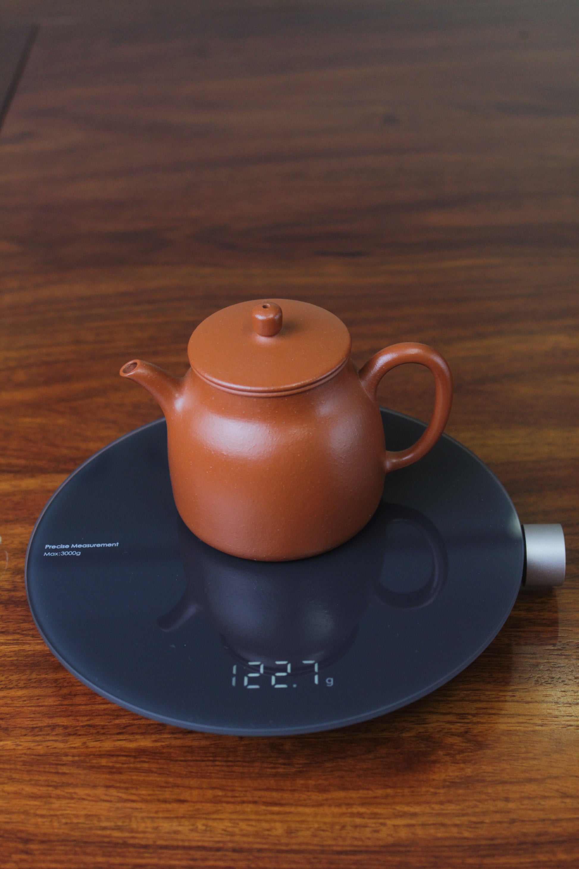 Weight of Collectible teapot handmade with purple clay lao zhu ni