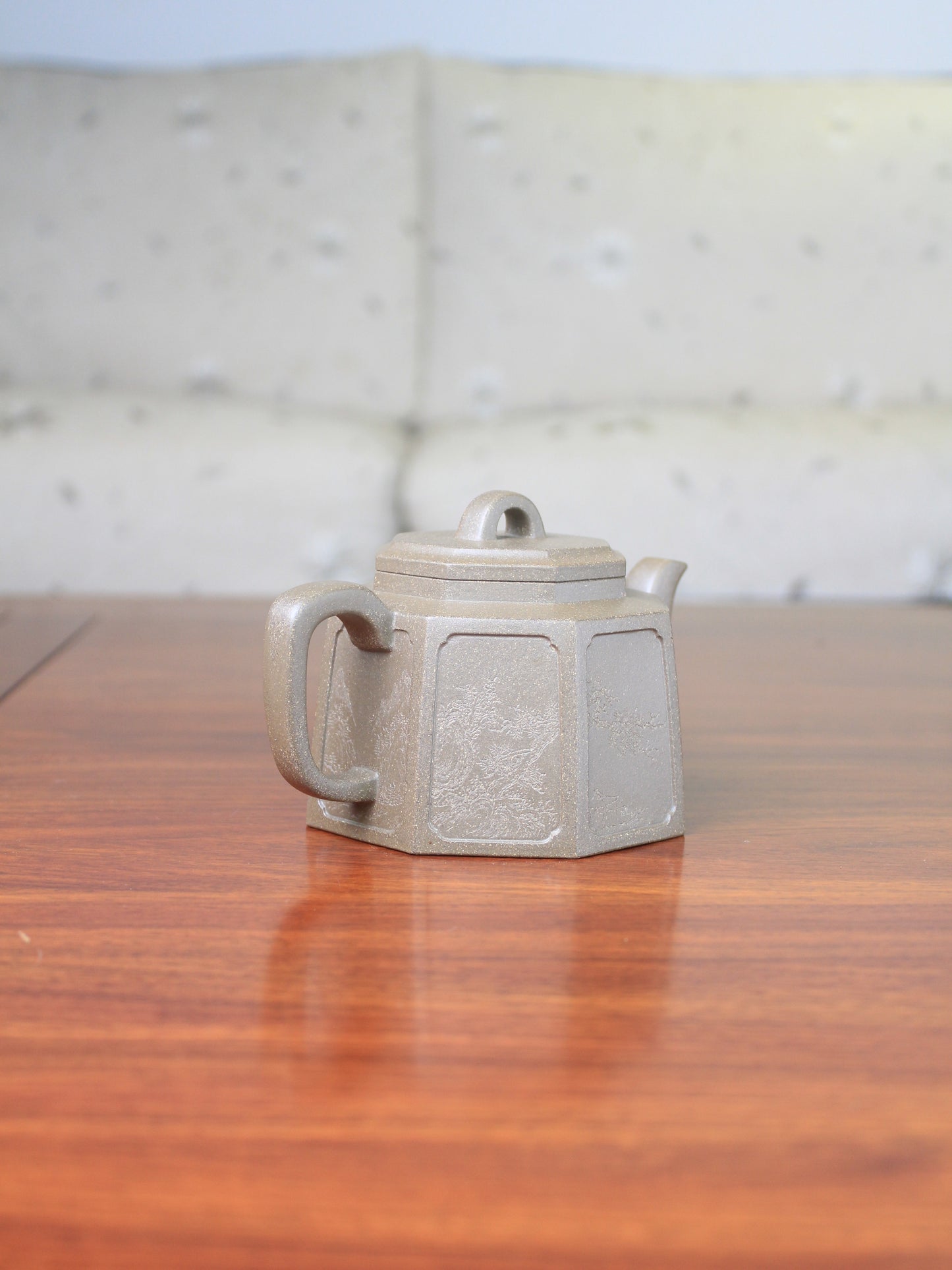Side of the collectible teapot named ba fang
