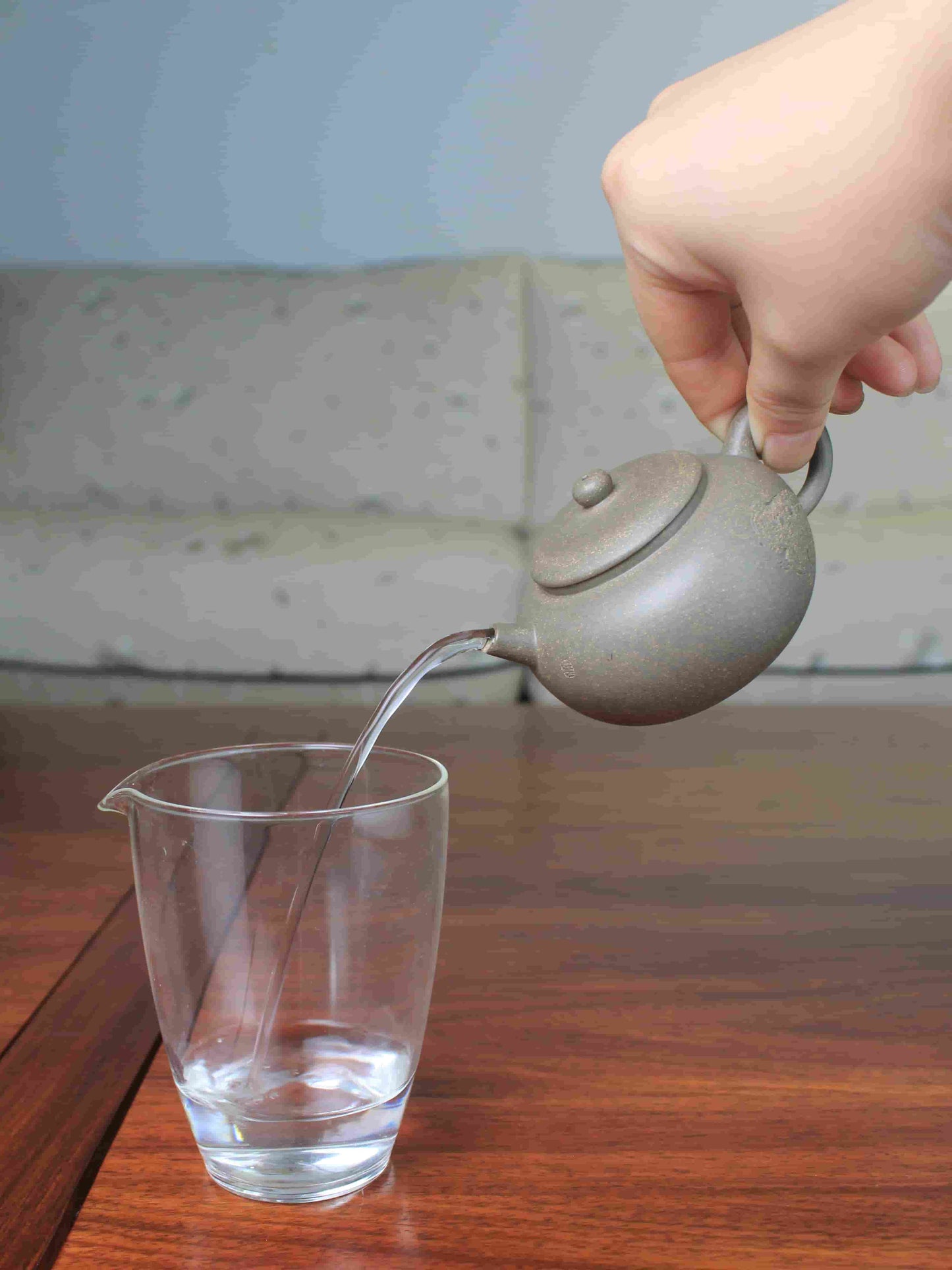 Good pour of the Collectible teapot named toad, handmade by teapot artist