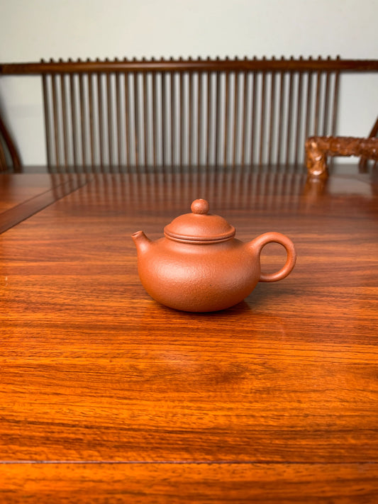 handmade yixing teapot rong tian on the table
