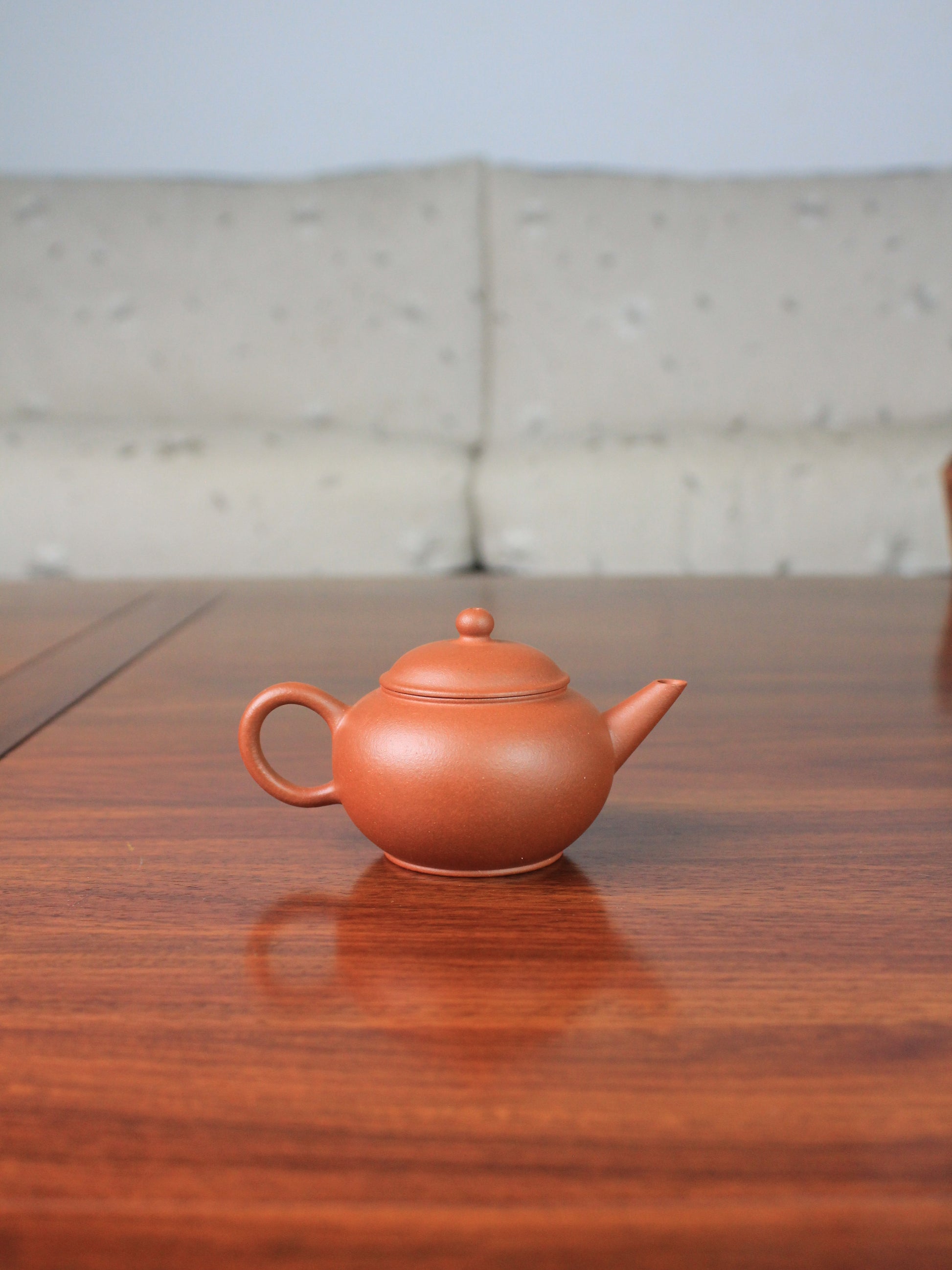 Back of shui ping teapot, designed for loose leaf tea