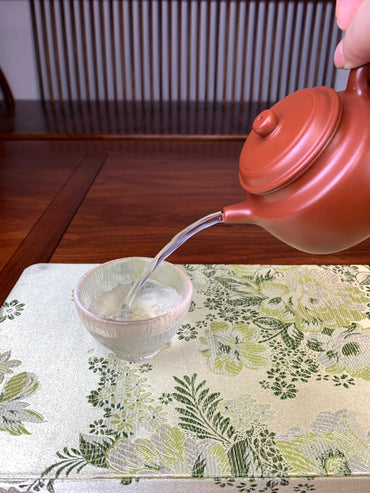 the perfect pour of the handmade de zhong yixing teapot
