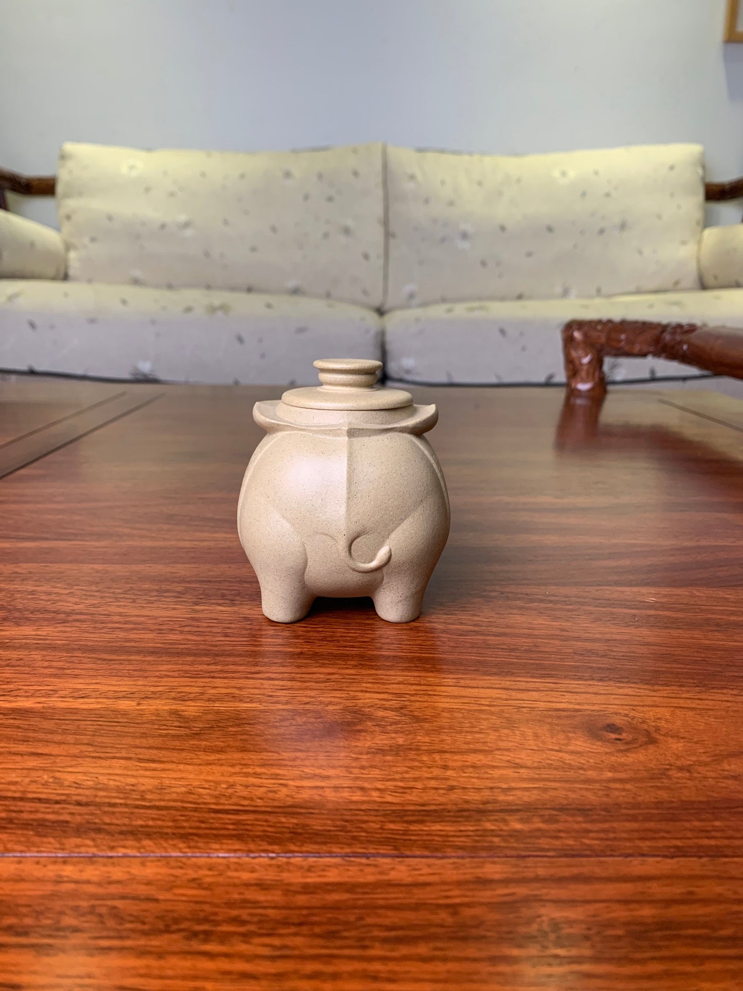 cute elephant clay teapot behind