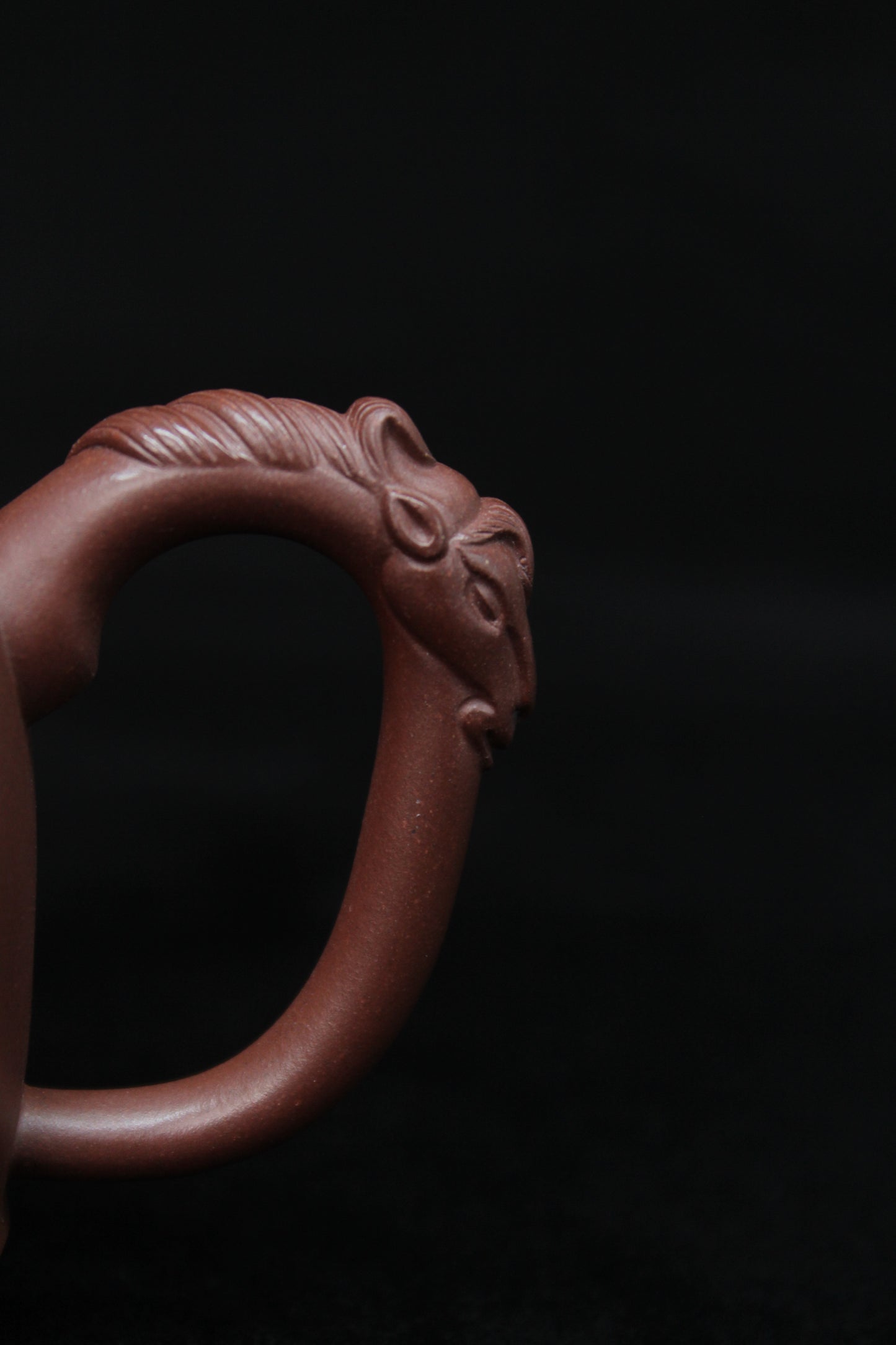 Handle of Vintage teapot come from zisha art gallery handmade with purple clay