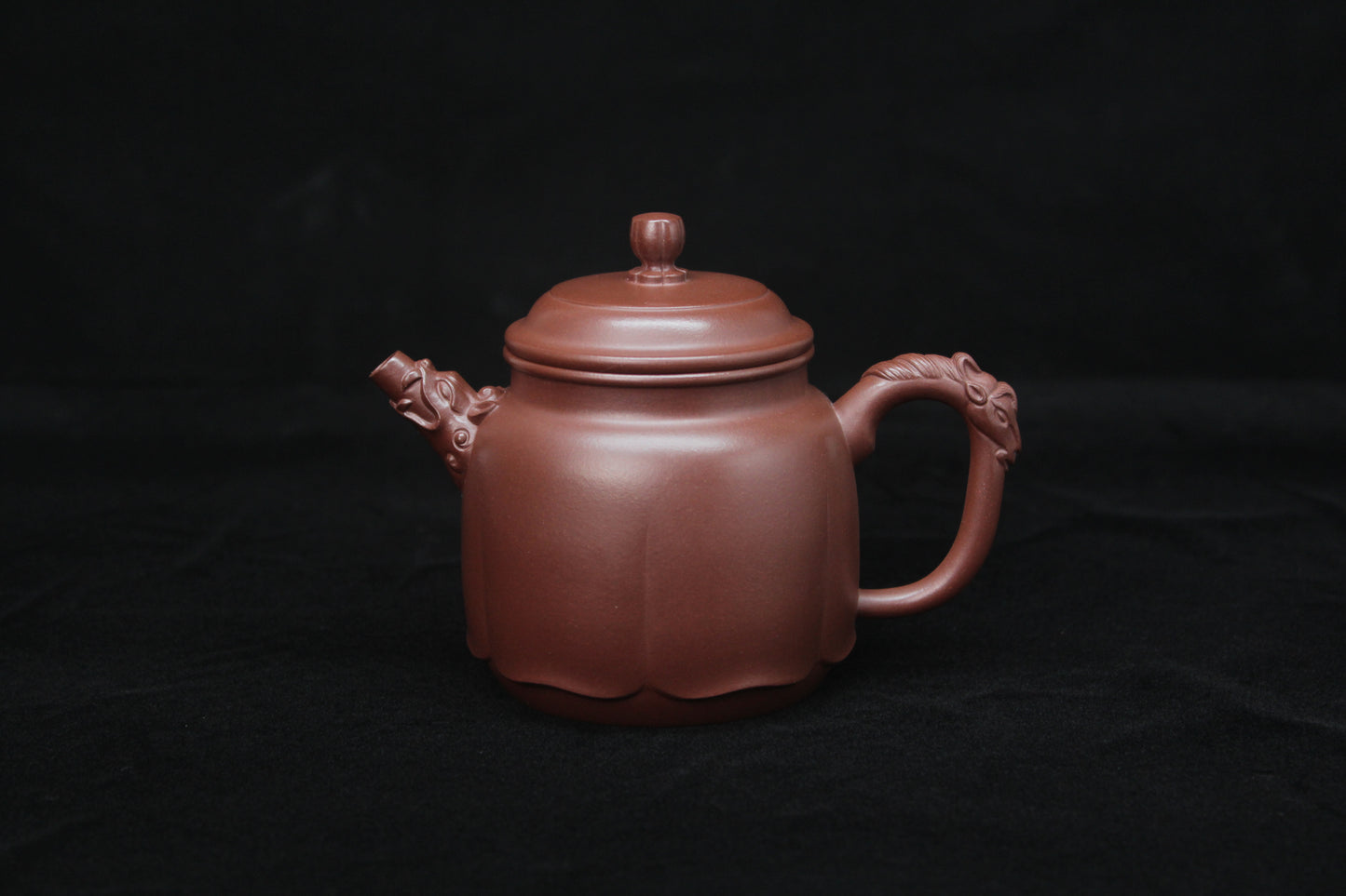 Vintage teapot come from zisha art gallery handmade with purple clay front detail
