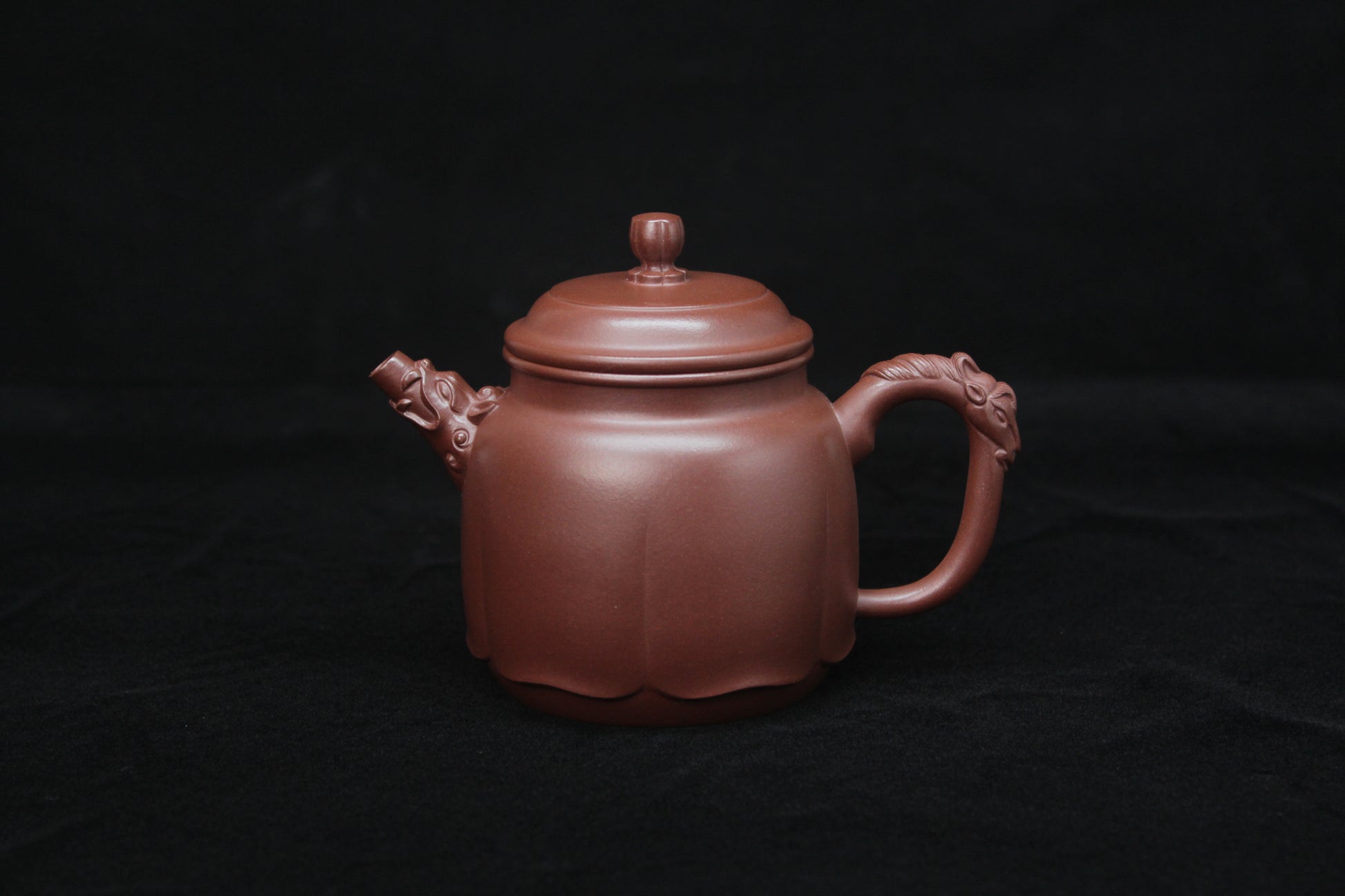 Vintage teapot come from zisha art gallery handmade with purple clay front detail
