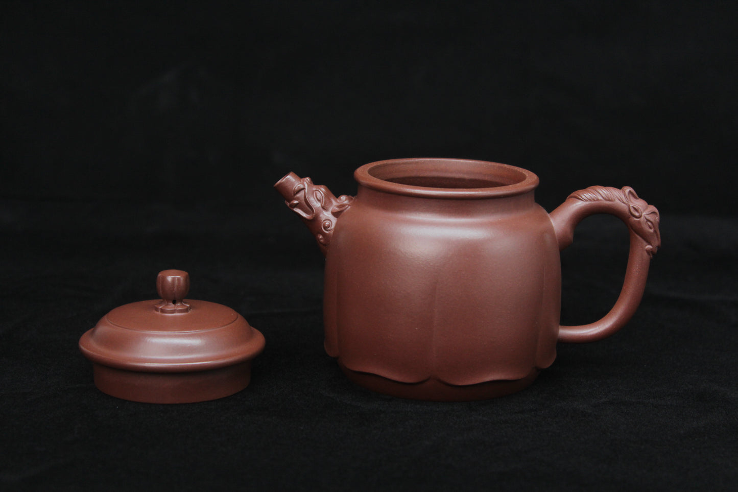 Vintage teapot come from zisha art gallery handmade with purple clay front detail
