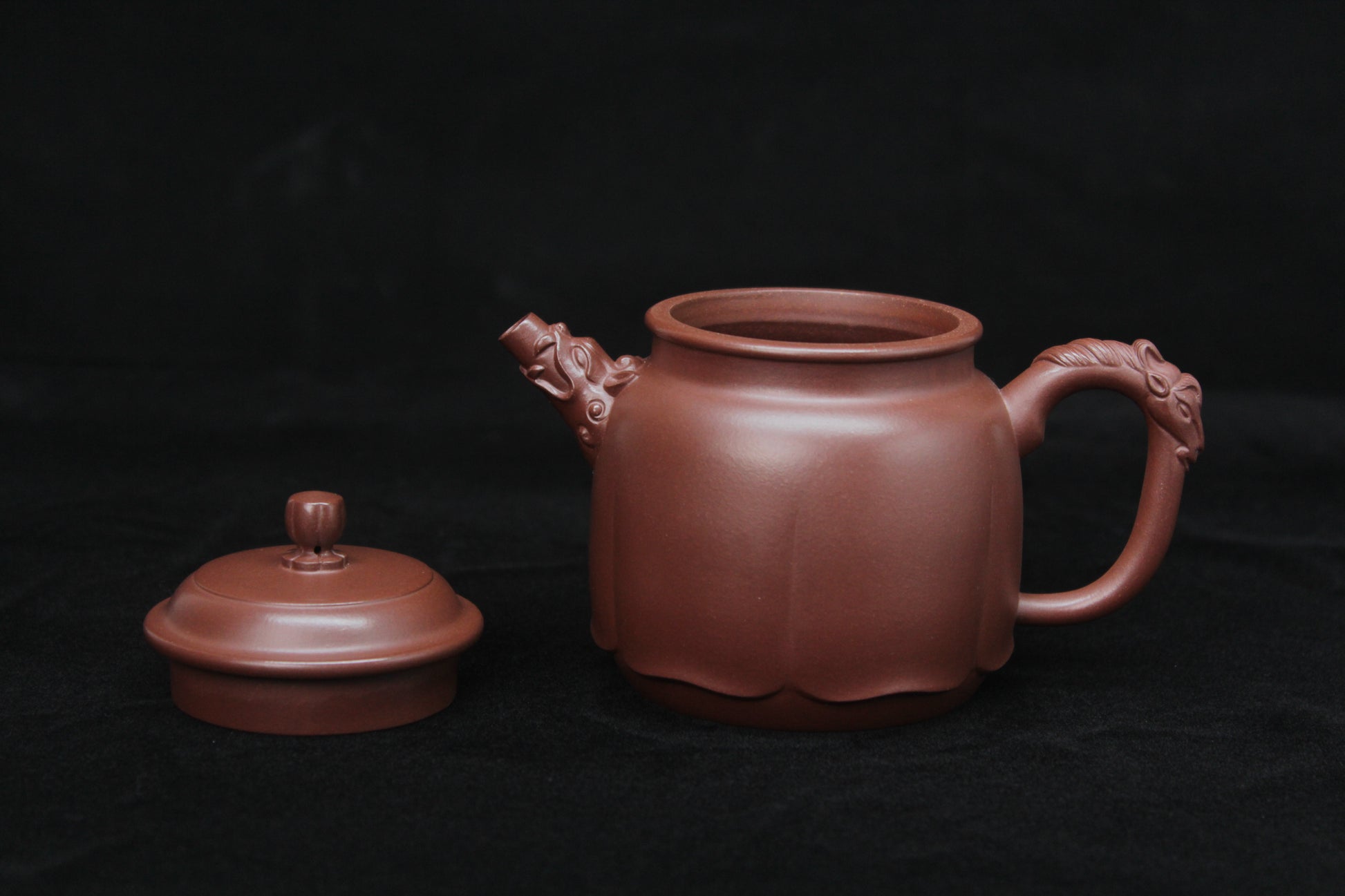 Vintage teapot come from zisha art gallery handmade with purple clay front detail