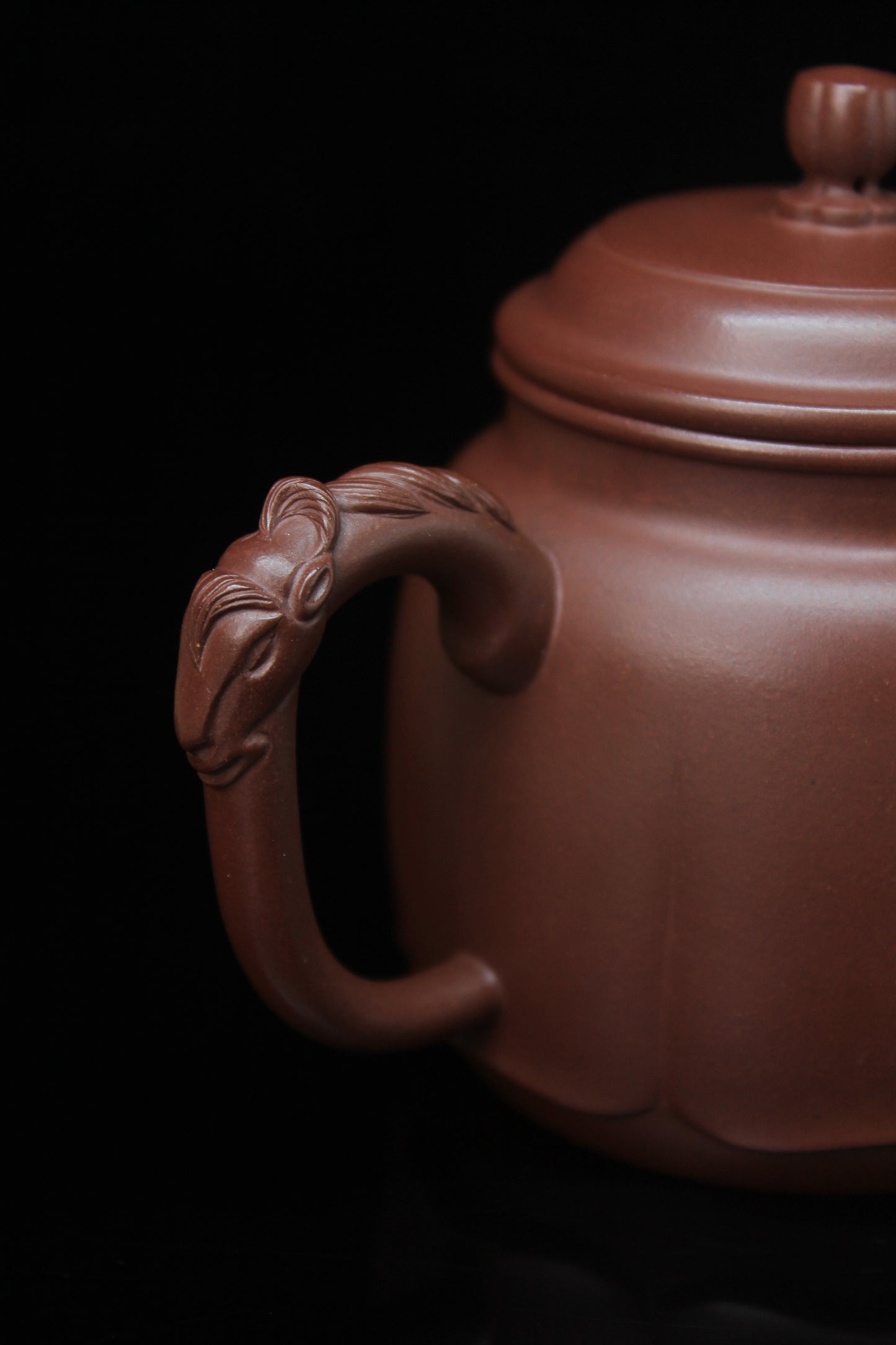 Handle of Vintage teapot come from zisha art gallery handmade with purple clay