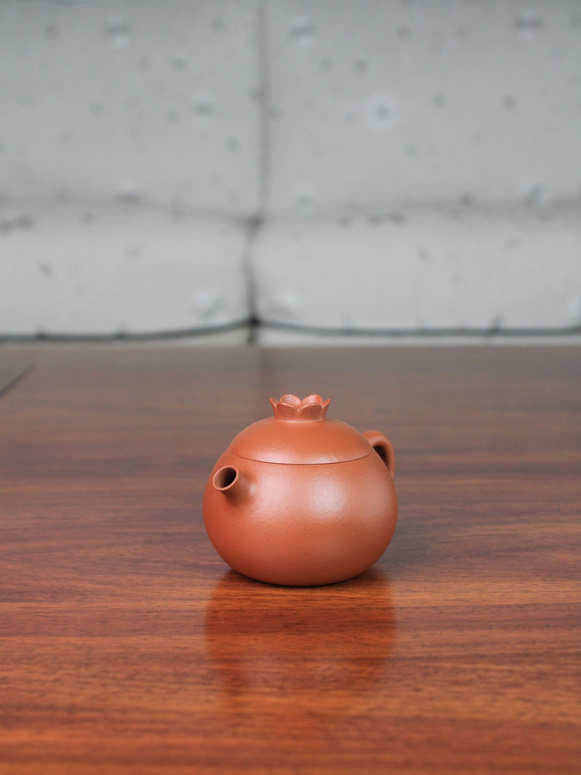 right view of yi shing teapot named flower on the table