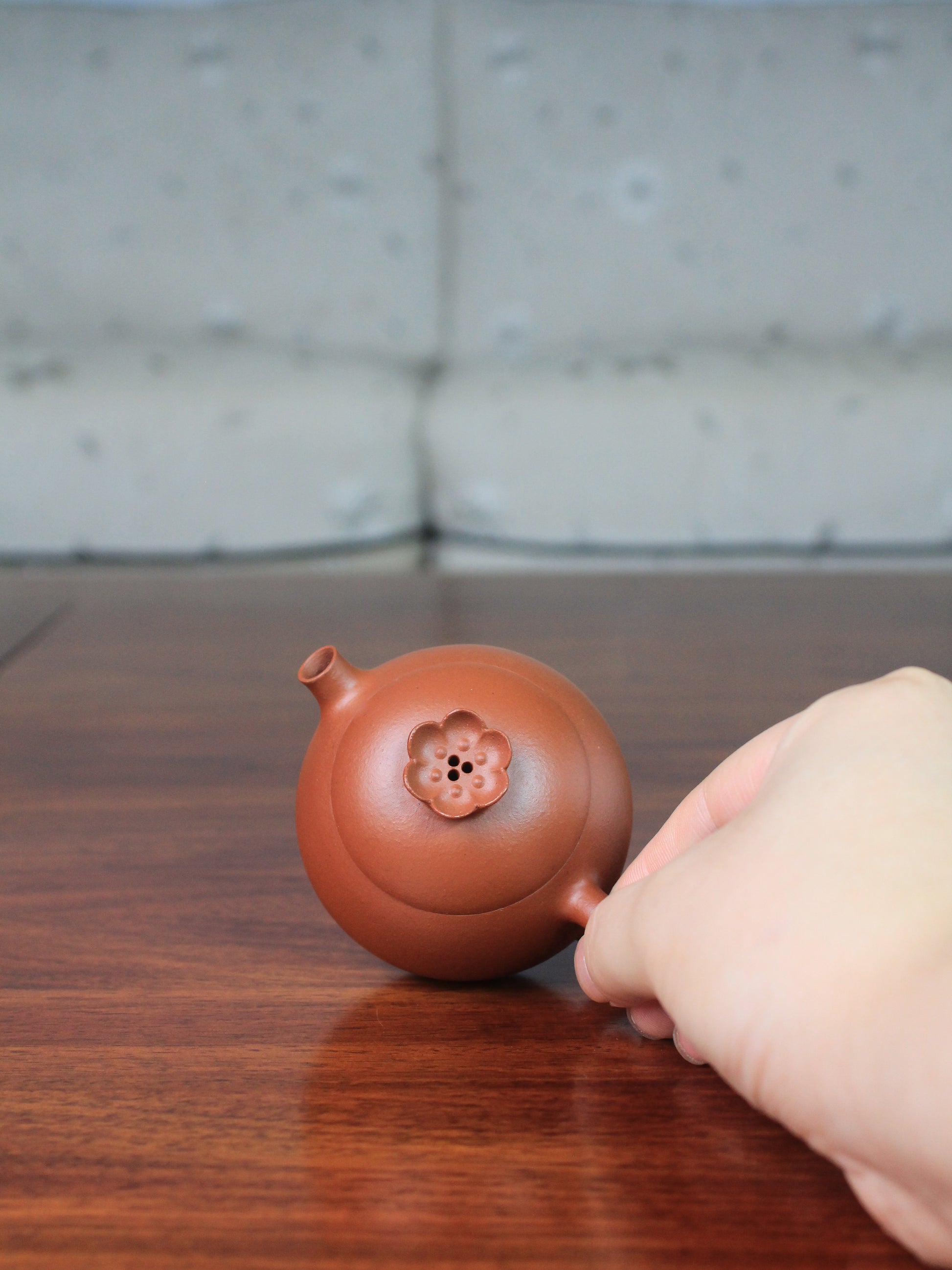 top view of yi shing teapot named flower on the table