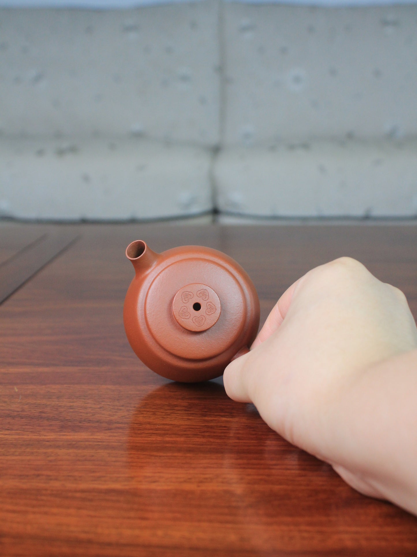 Top view of yi shing teapot named de zhong handmade with yixing clay