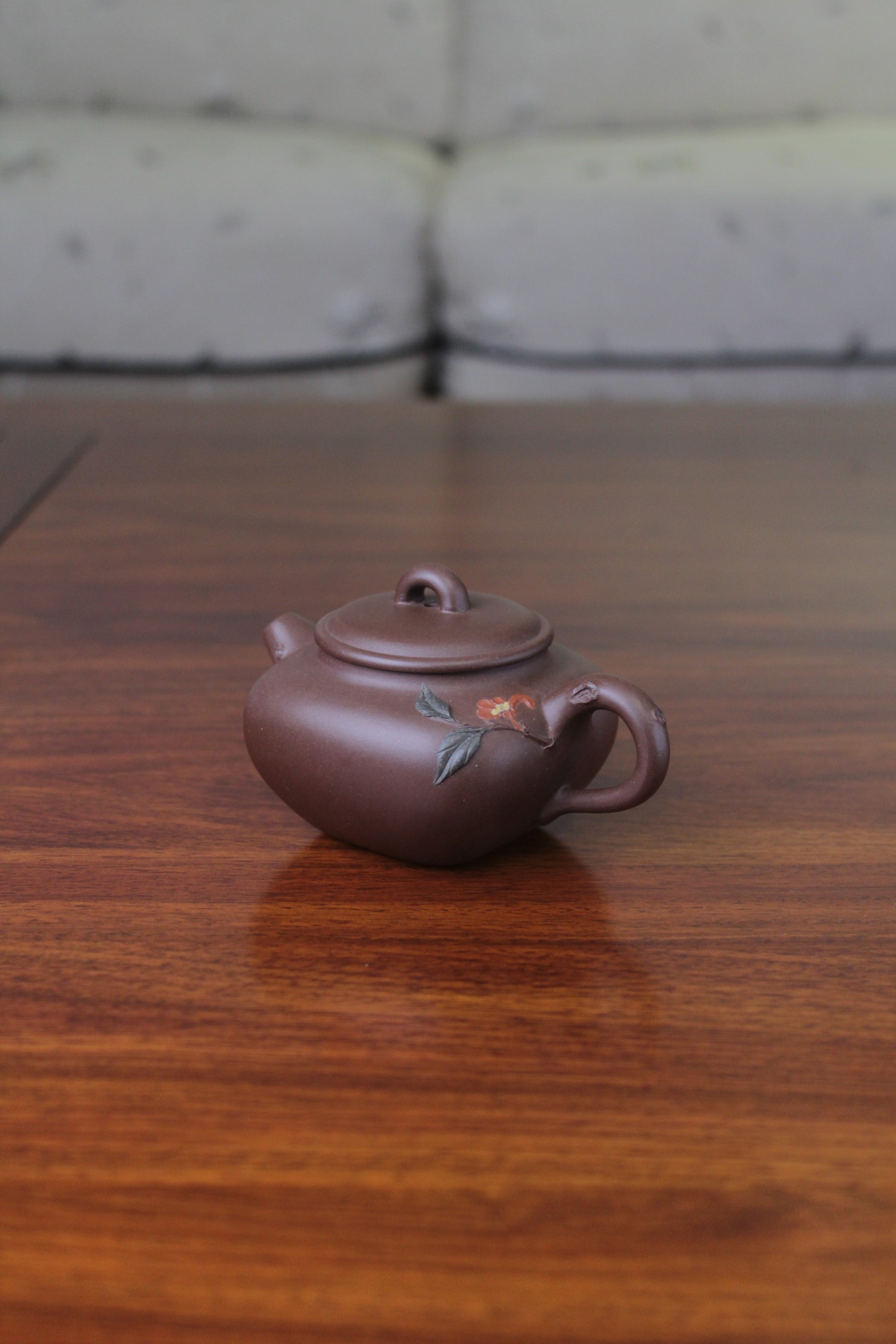 detail of yixing teapot named flower on the table