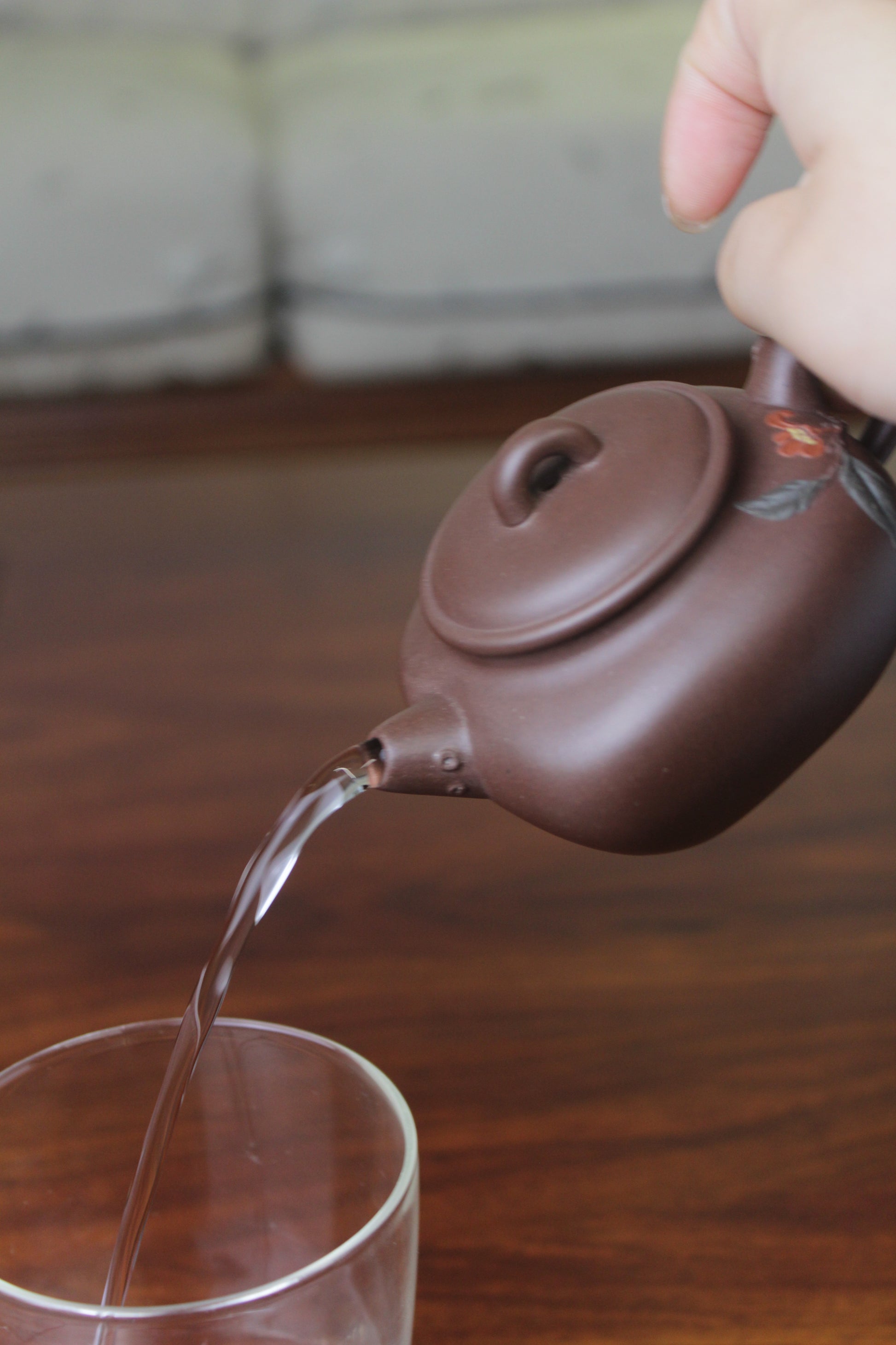 Pour of the yixing teapot named flower