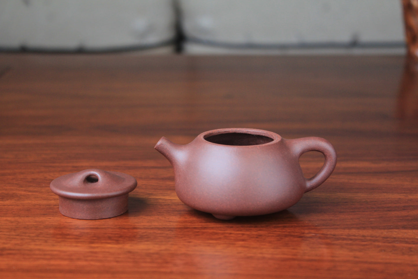 Detail of the Collectible teapot from yixing on the table