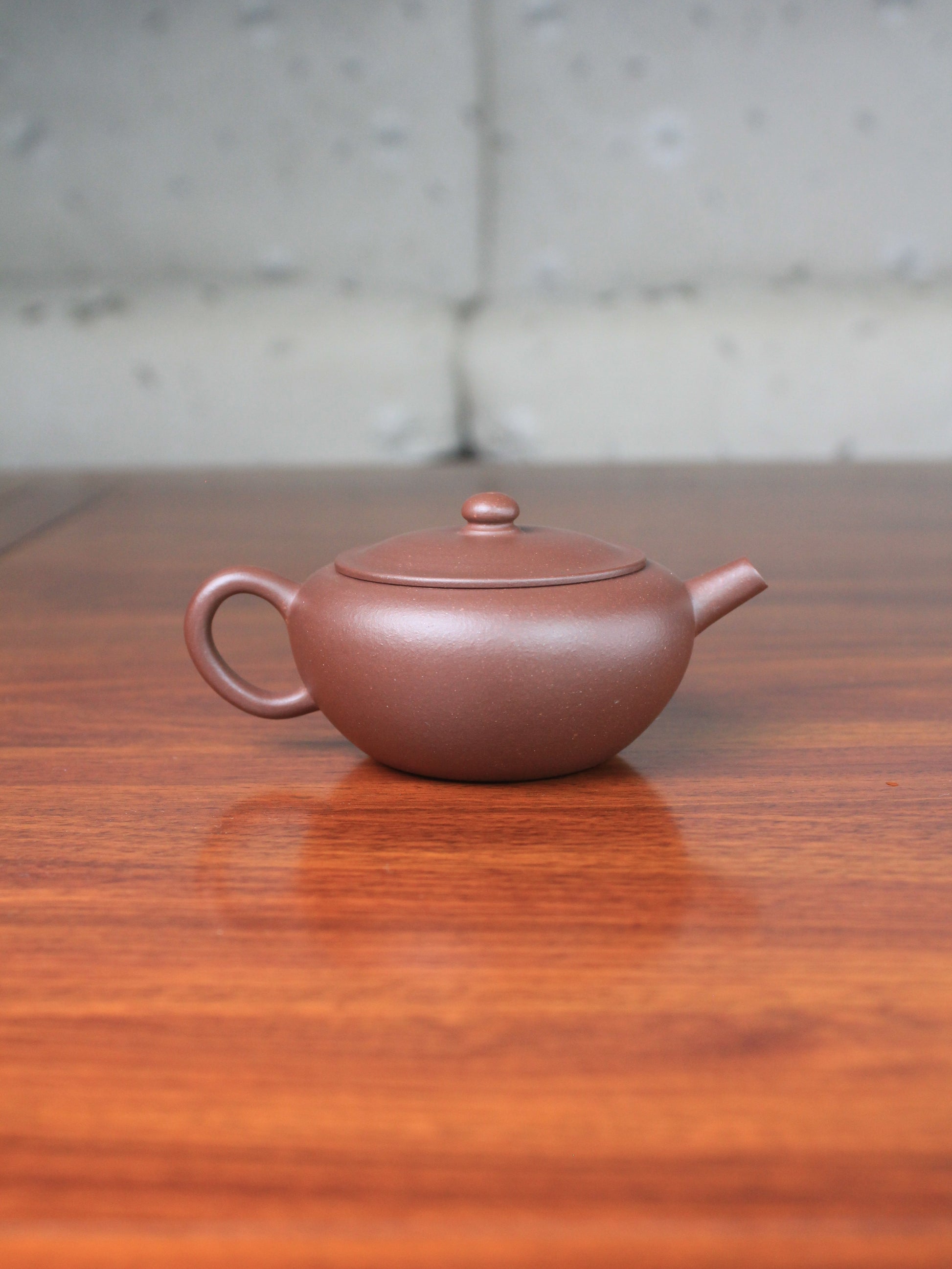 Back of the yixing teapot handmade by teapot artist