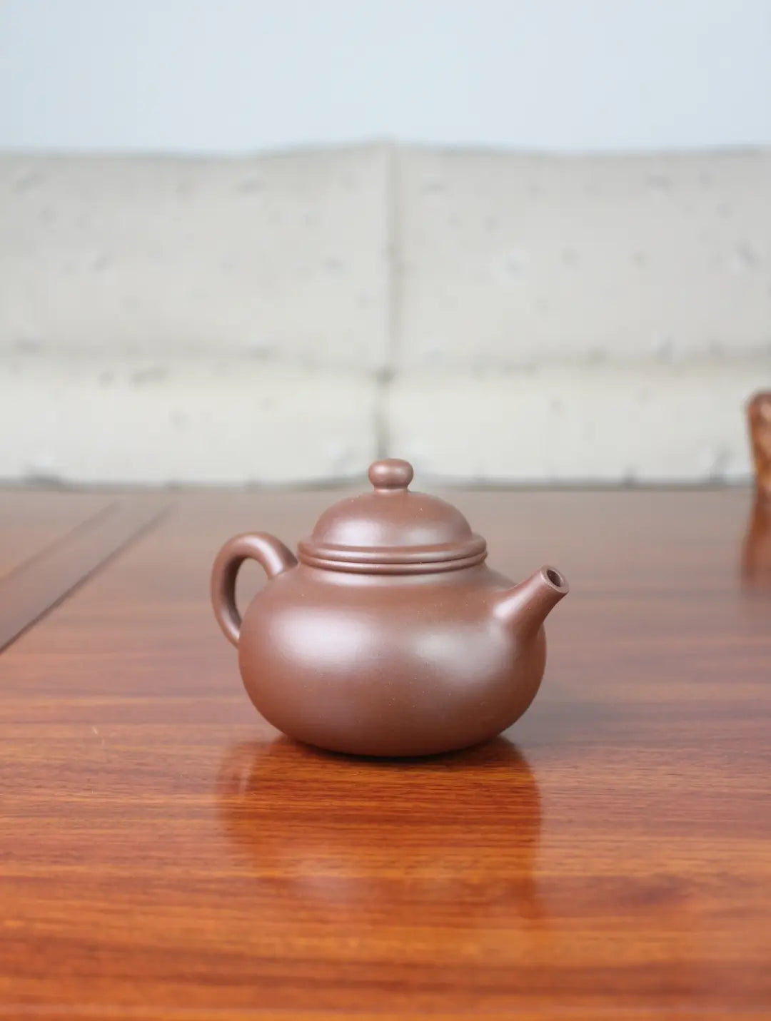 left view of zisha teapot rong tian