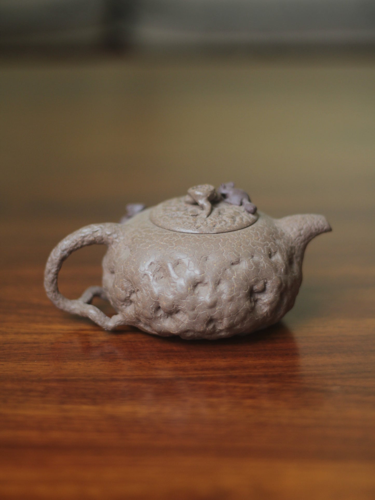 Teapots named squirrels handmade with clay back