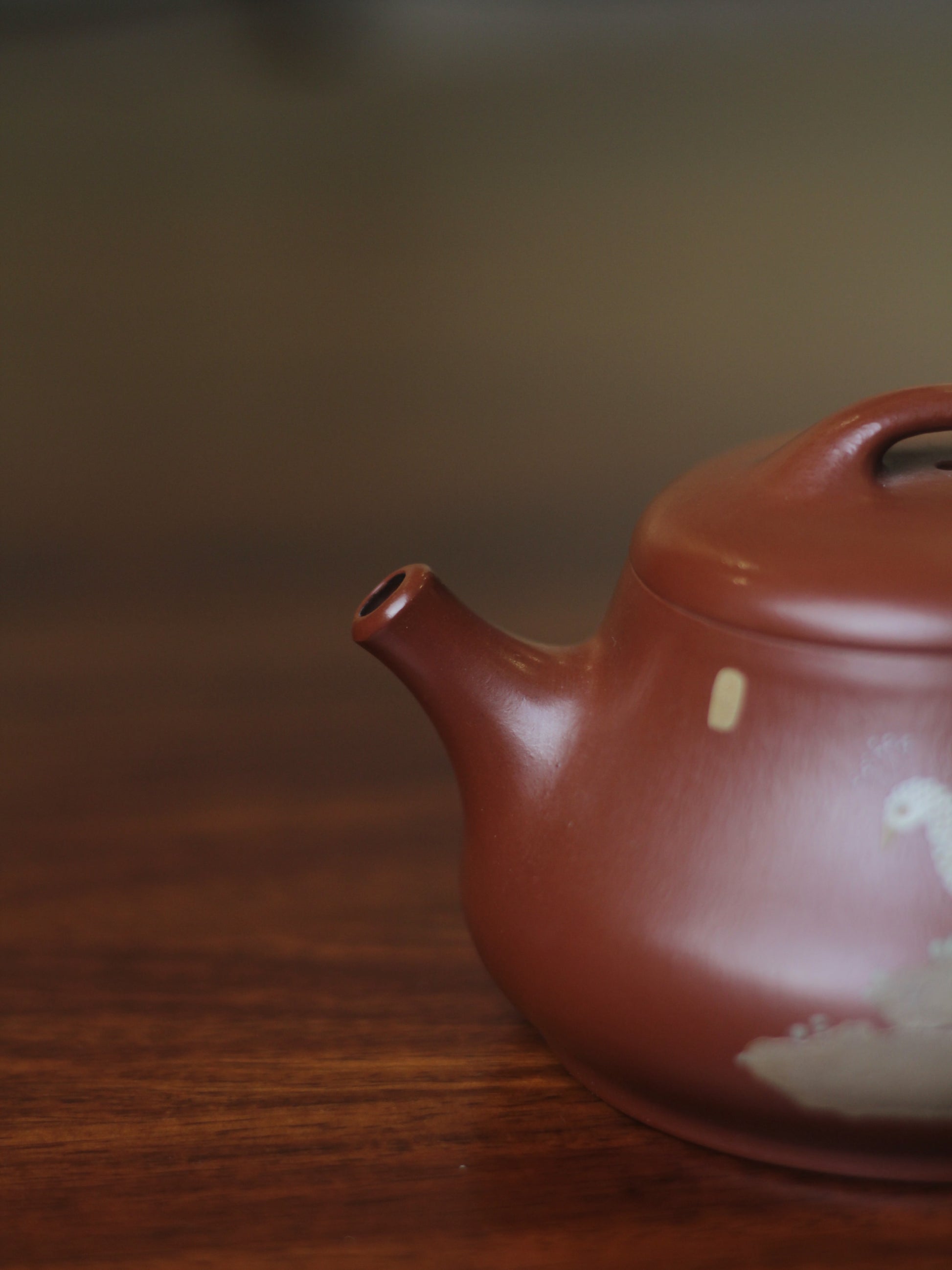 Yixing clay teapot peacock mouth detail