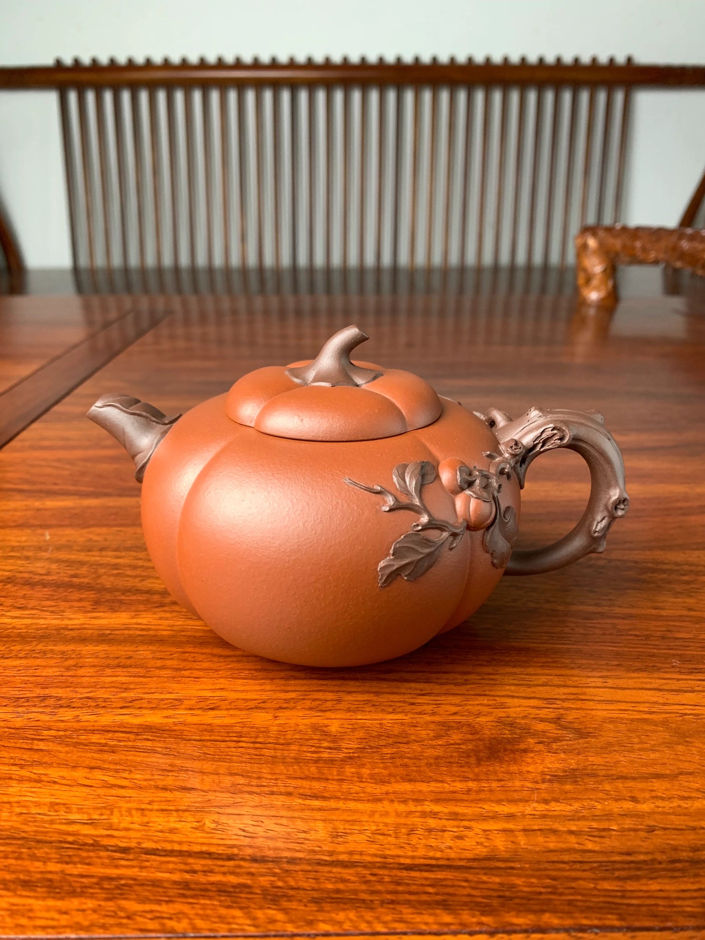 art collection teapot named pumpkin on the table