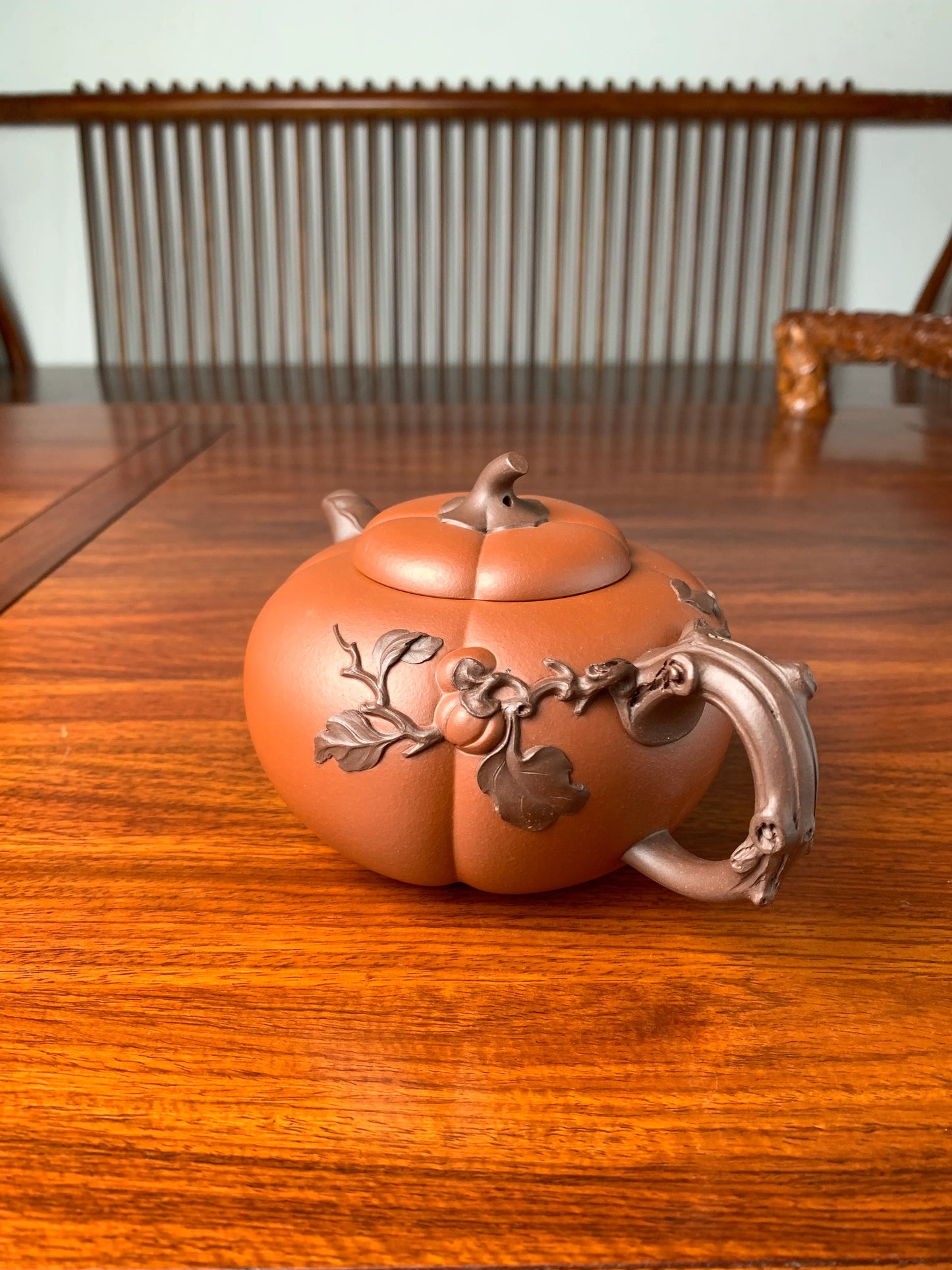 right view of art collection teapot named pumpkin on the table