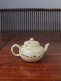 Art collection teapot with painting on it